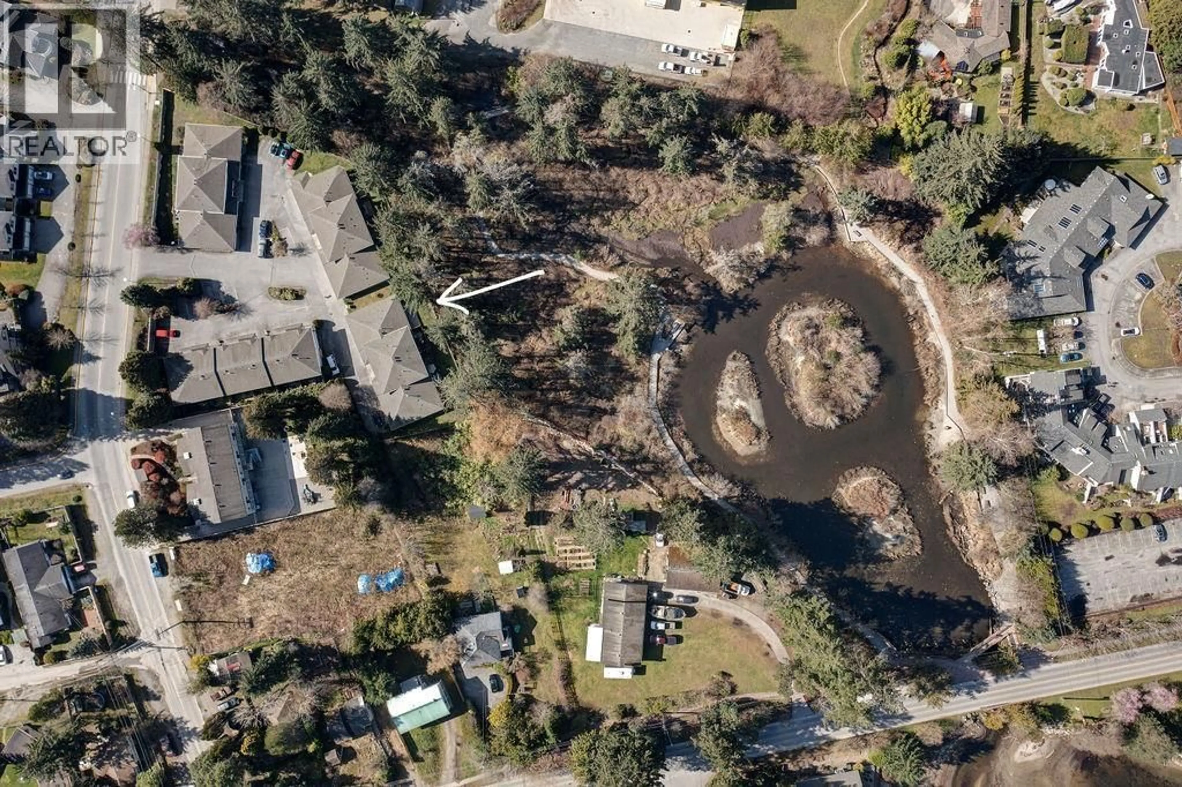 A pic from outside/outdoor area/front of a property/back of a property/a pic from drone, street for 4 - 5706 EBBTIDE STREET, Sechelt British Columbia V7Z0J4