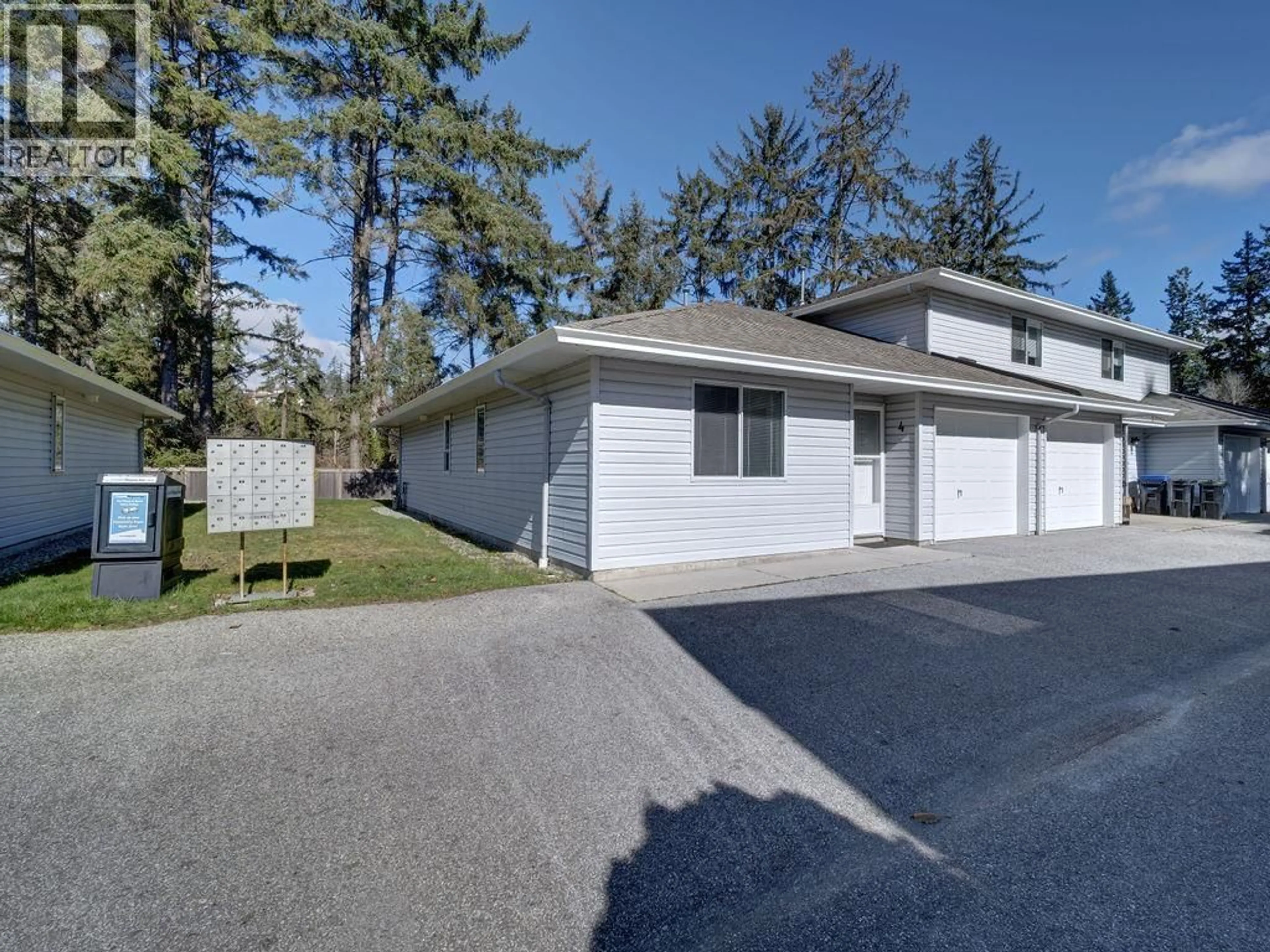 A pic from outside/outdoor area/front of a property/back of a property/a pic from drone, street for 4 - 5706 EBBTIDE STREET, Sechelt British Columbia V7Z0J4