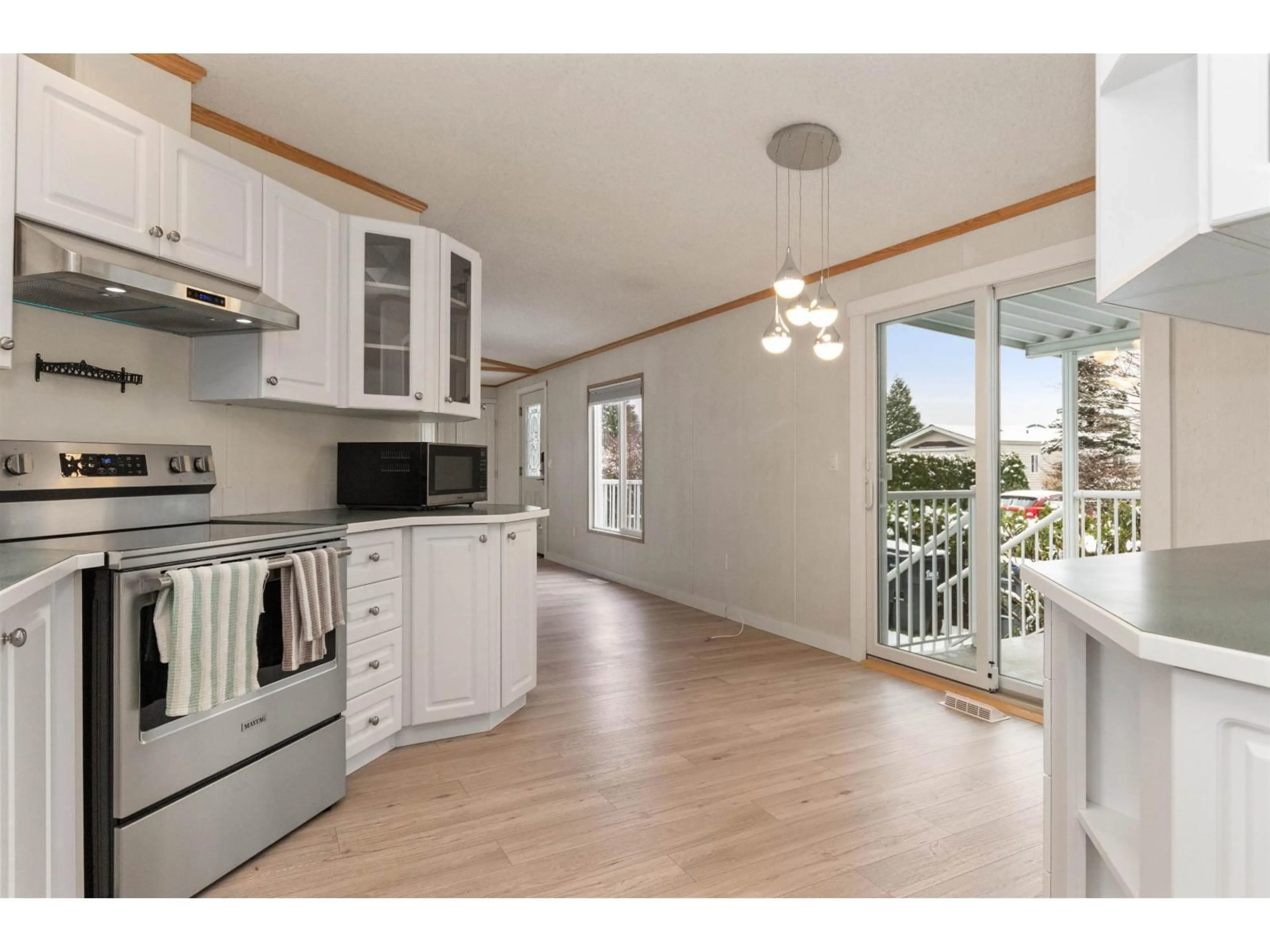 Open concept kitchen, wood/laminate floor for 14 - 62790 FLOOD HOPE ROAD, Hope British Columbia V0X1L2