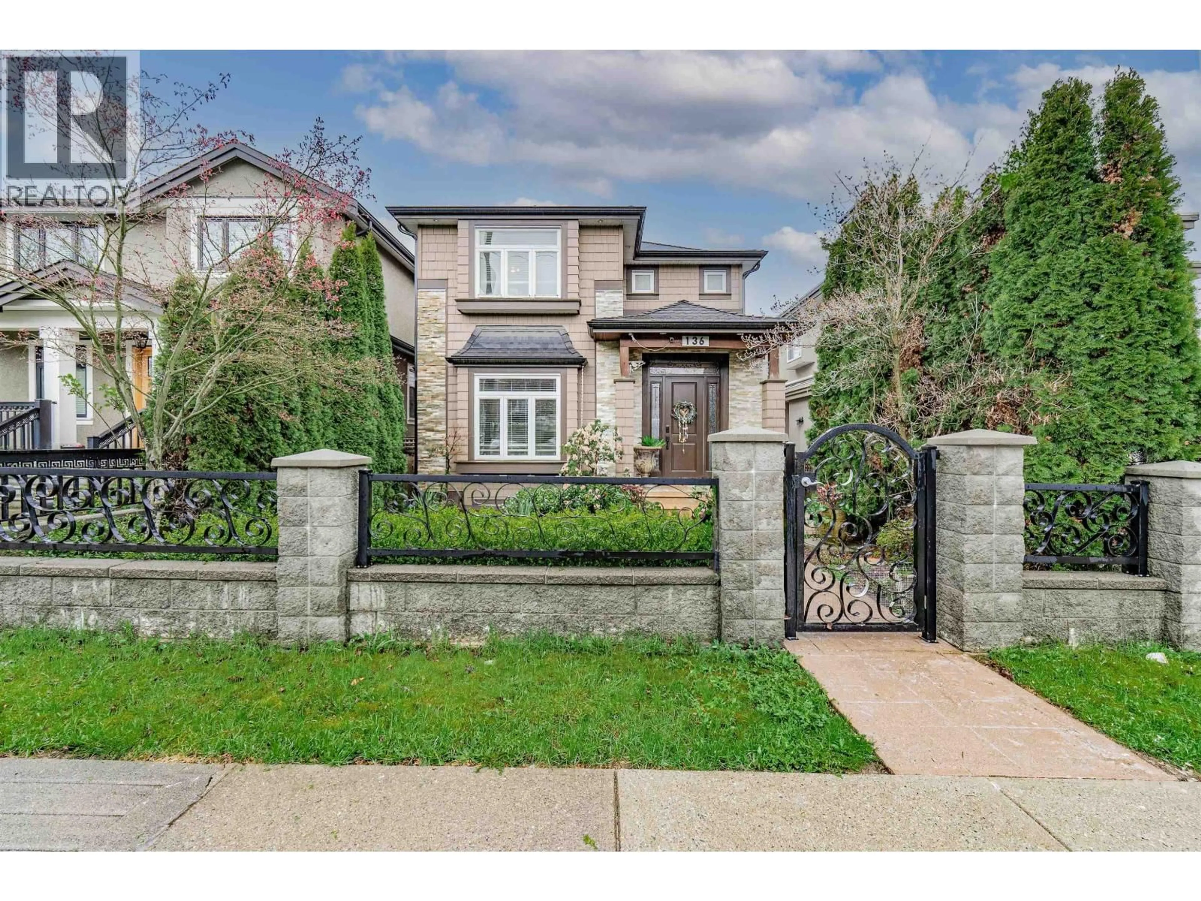 Home with brick exterior material, street for 136 59TH AVENUE, Vancouver British Columbia V5X1X6