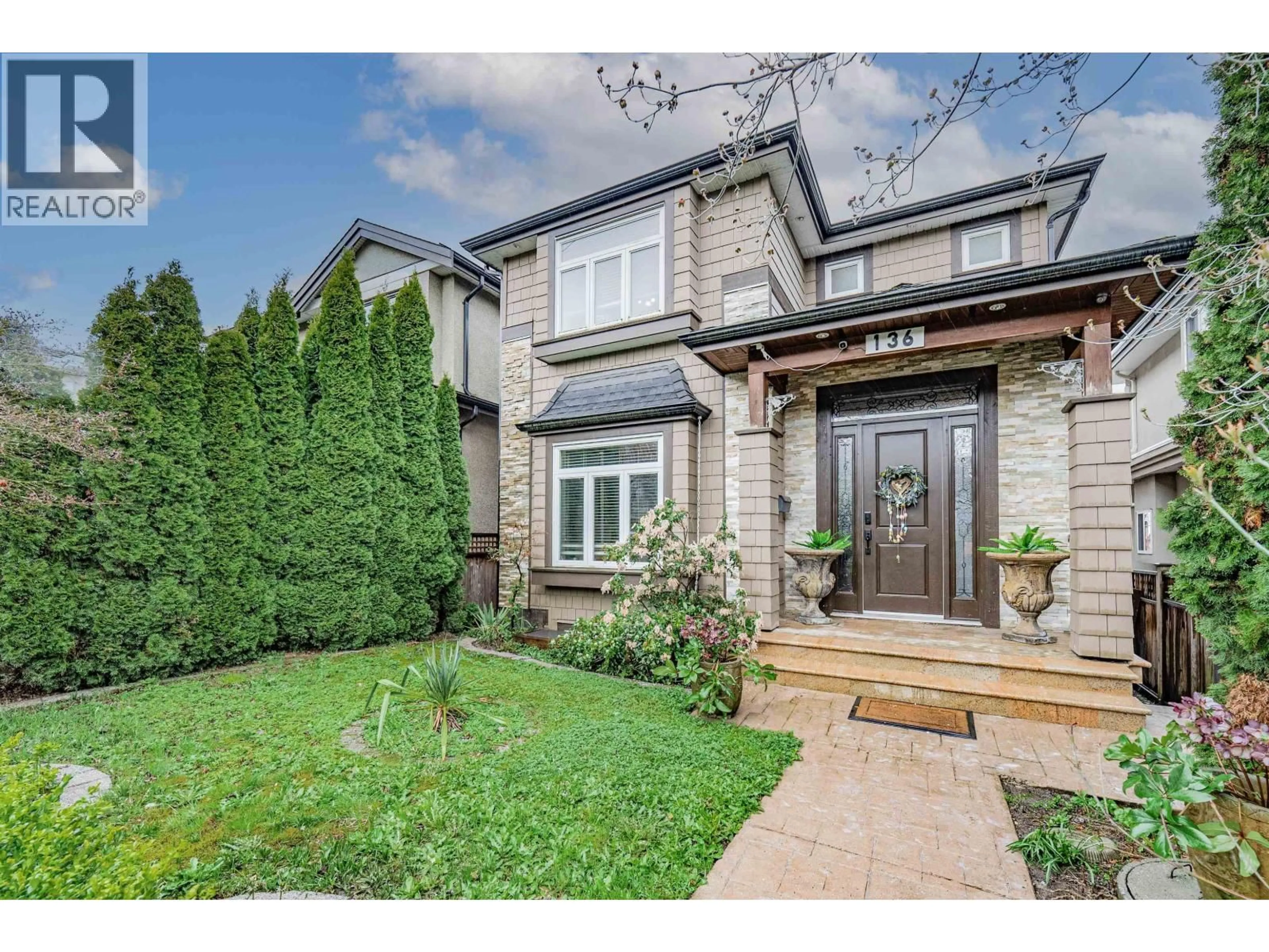 Home with brick exterior material, street for 136 59TH AVENUE, Vancouver British Columbia V5X1X6