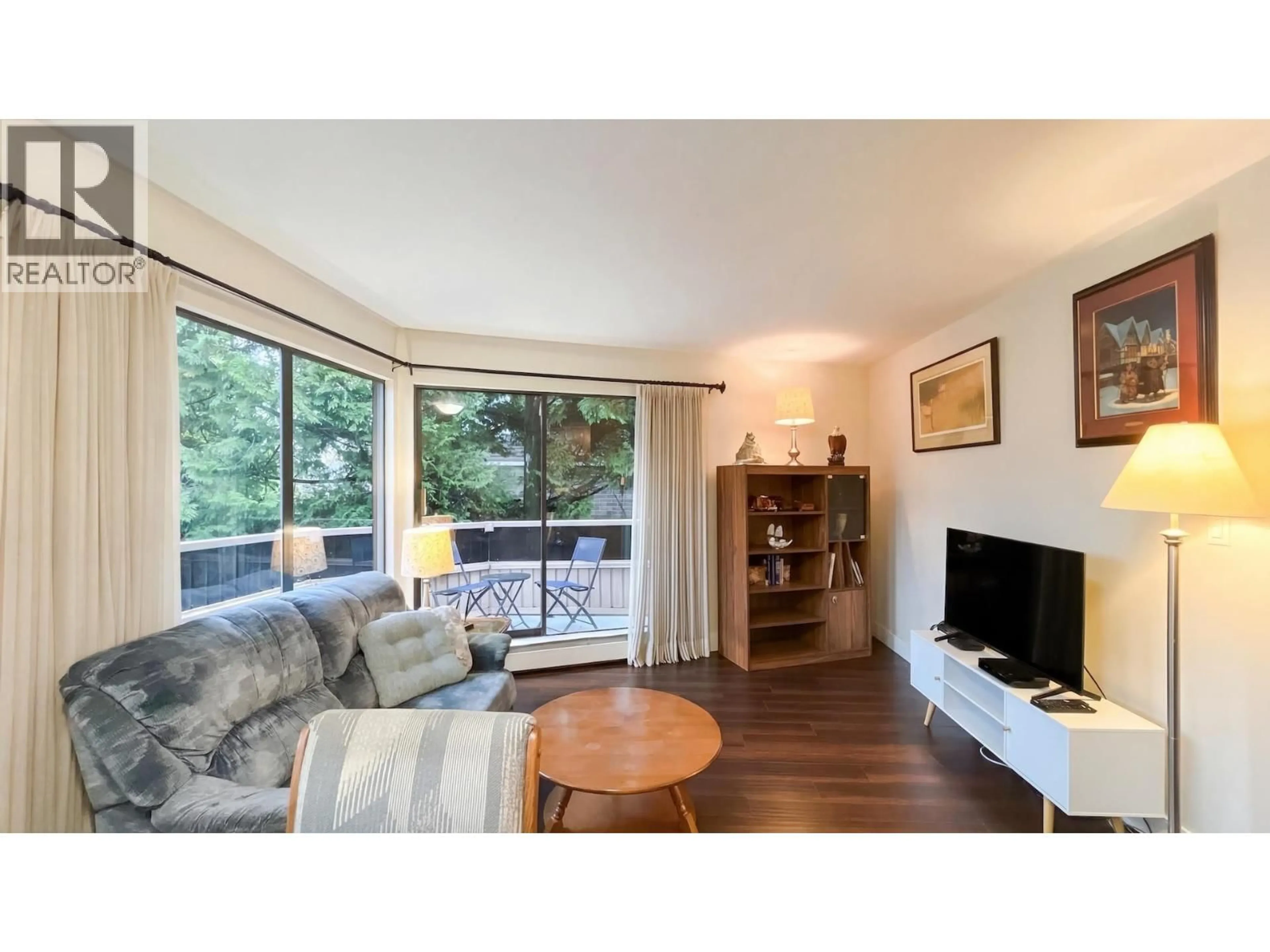 Living room with furniture, wood/laminate floor for 305 - 2190 8TH AVENUE, Vancouver British Columbia V6K2A4