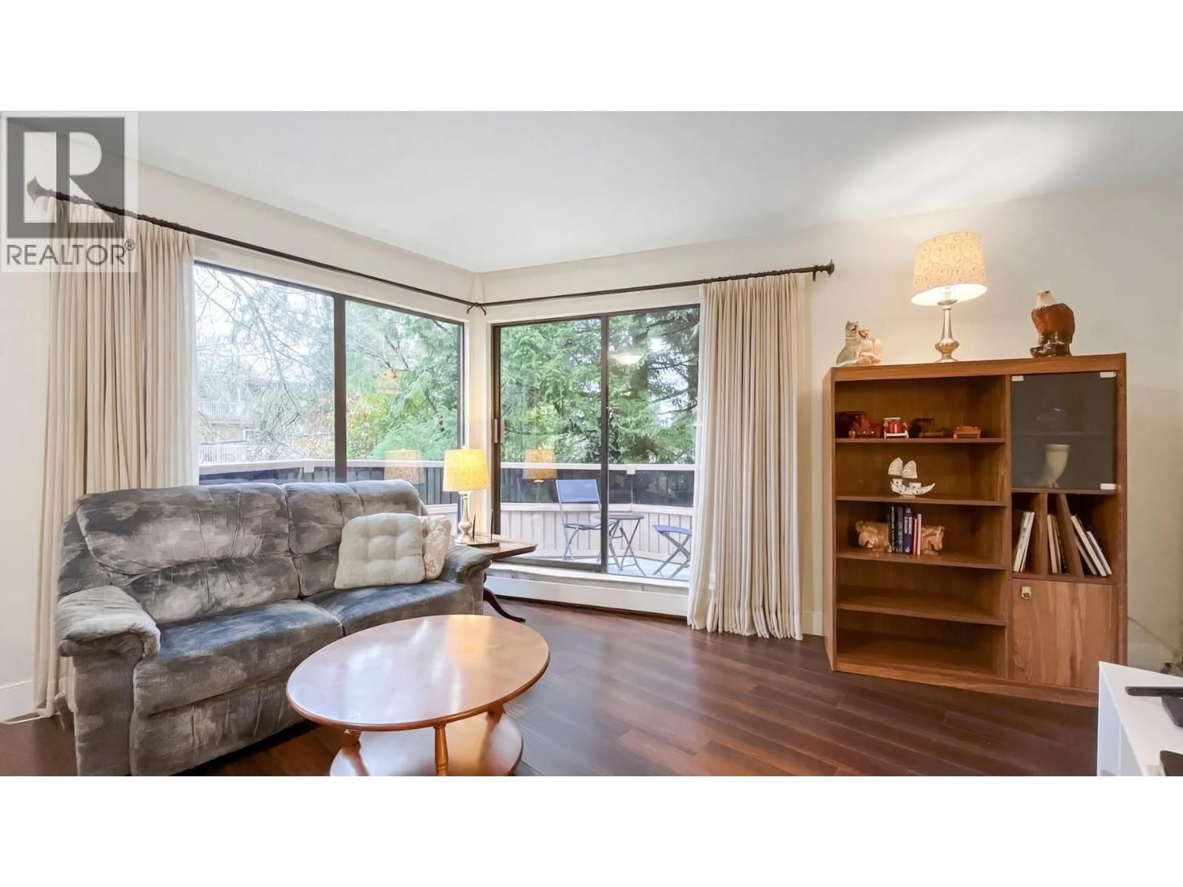 Living room with furniture, wood/laminate floor for 305 - 2190 8TH AVENUE, Vancouver British Columbia V6K2A4