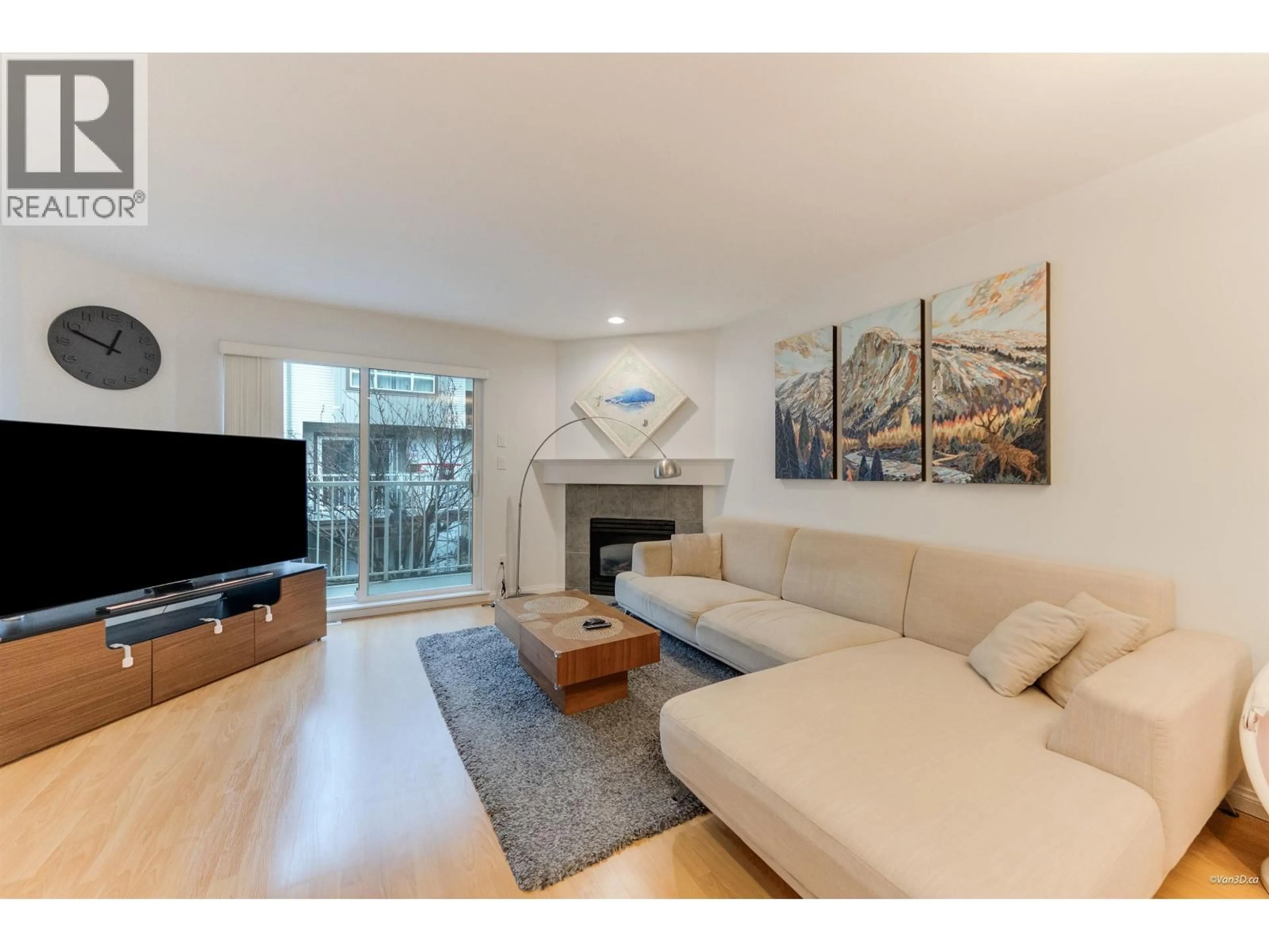 Living room with furniture, wood/laminate floor for 3 - 22788 NORTON COURT, Richmond British Columbia V6V2W7