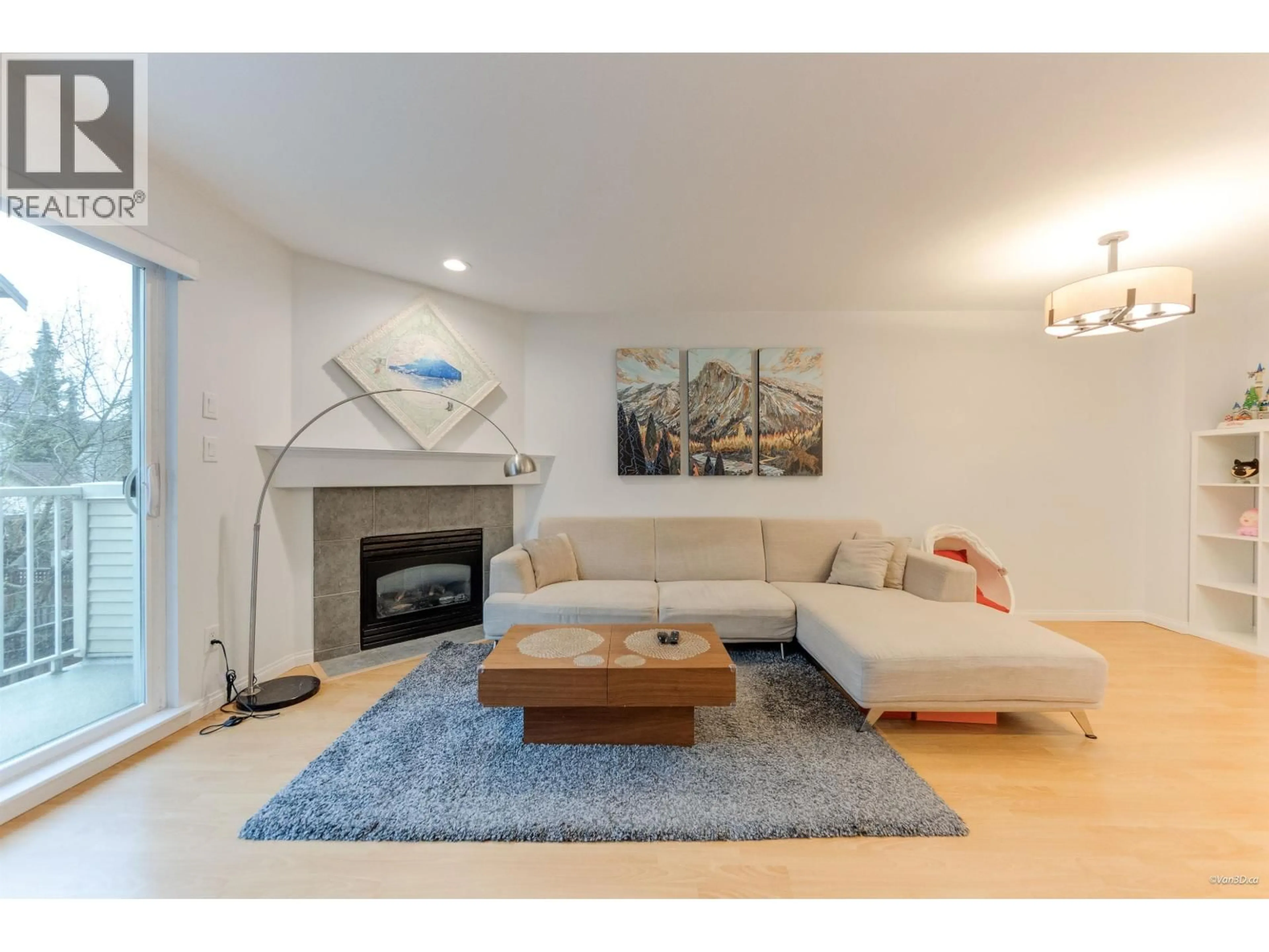 Living room with furniture, wood/laminate floor for 3 - 22788 NORTON COURT, Richmond British Columbia V6V2W7