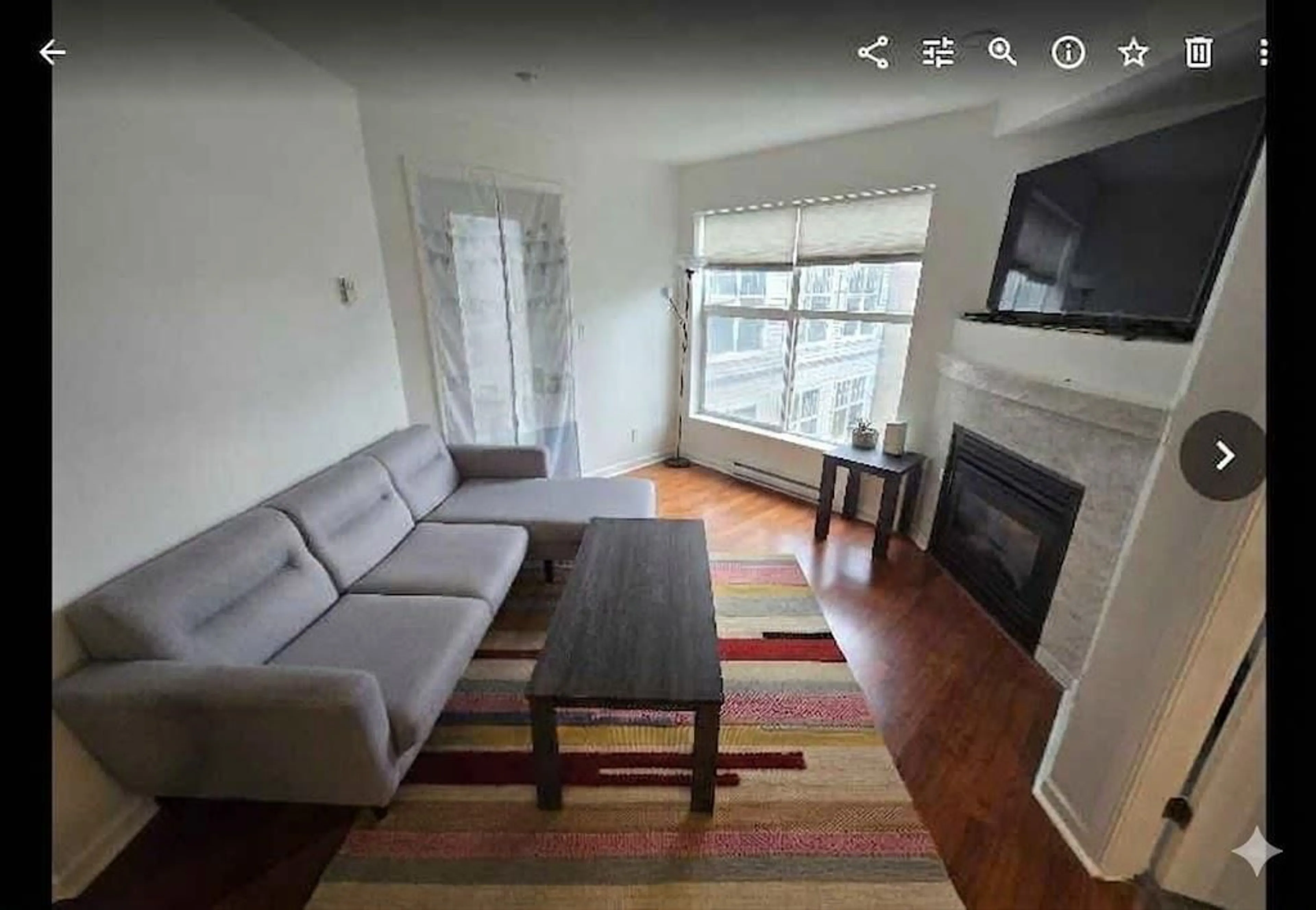 Living room with furniture, wood/laminate floor for 310 - 20200 56 AVENUE, Langley British Columbia V3A8S1