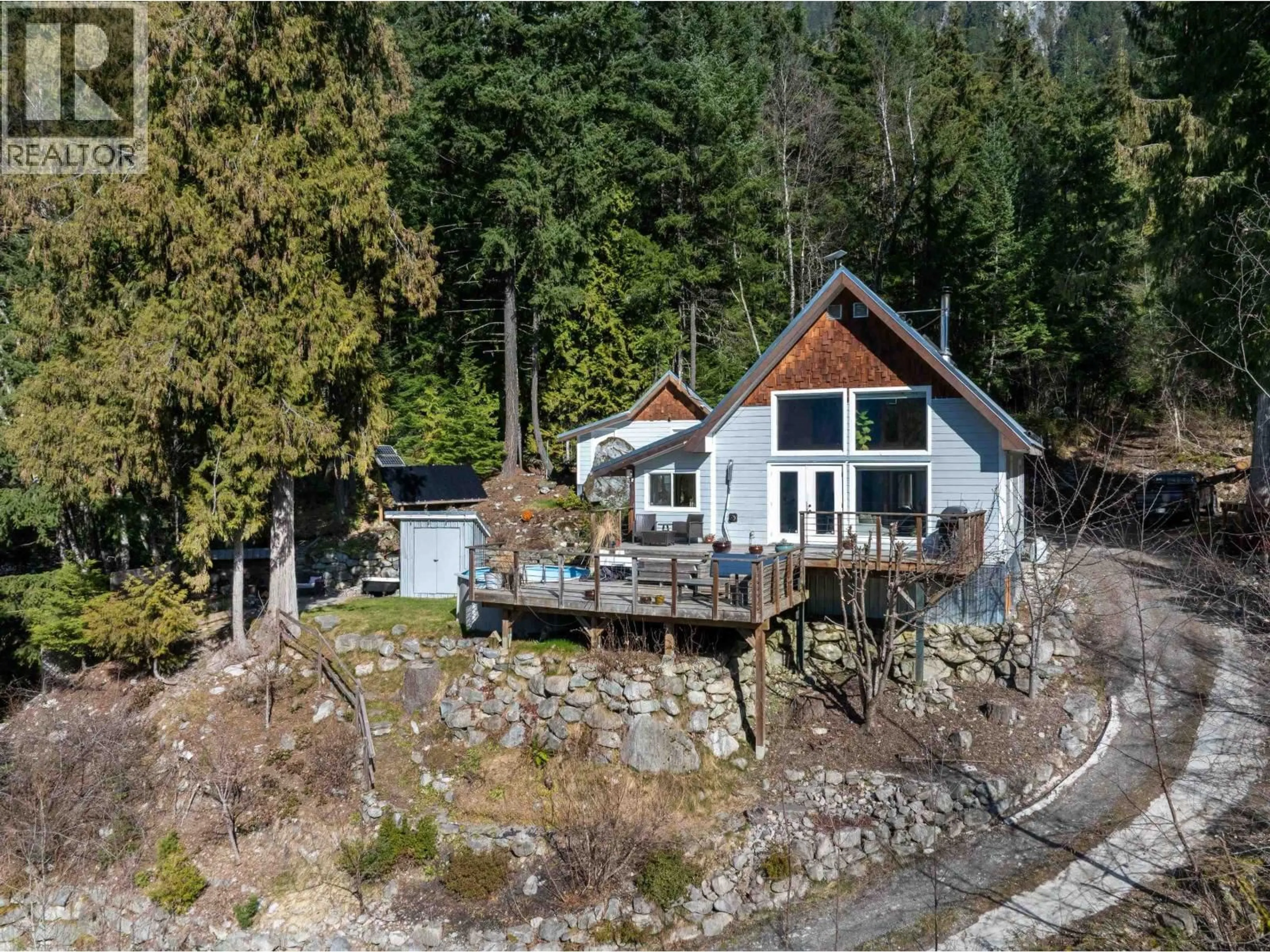 A pic from outside/outdoor area/front of a property/back of a property/a pic from drone, water/lake/river/ocean view for 144 - 6500 IN-SHUCK-CH FOREST SERVICE ROAD, Pemberton British Columbia V8E1A9
