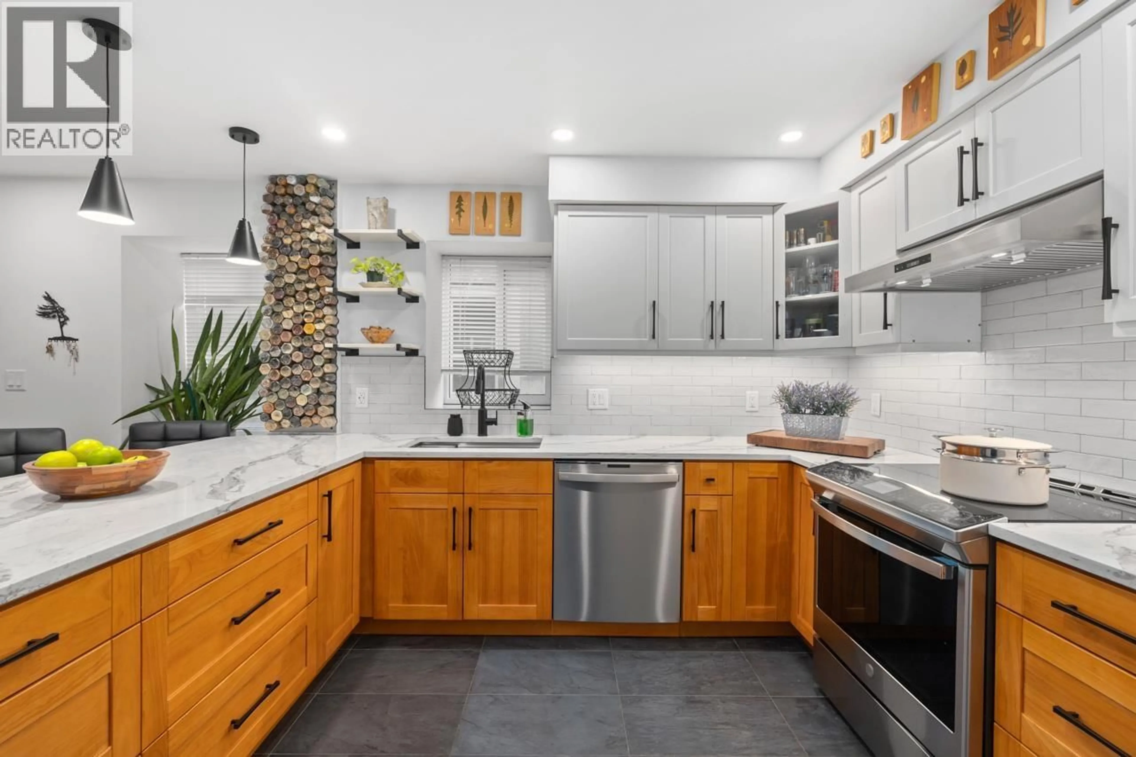 Contemporary kitchen, ceramic/tile floor for 203 - 1943 1ST AVENUE, Vancouver British Columbia V5N1B3