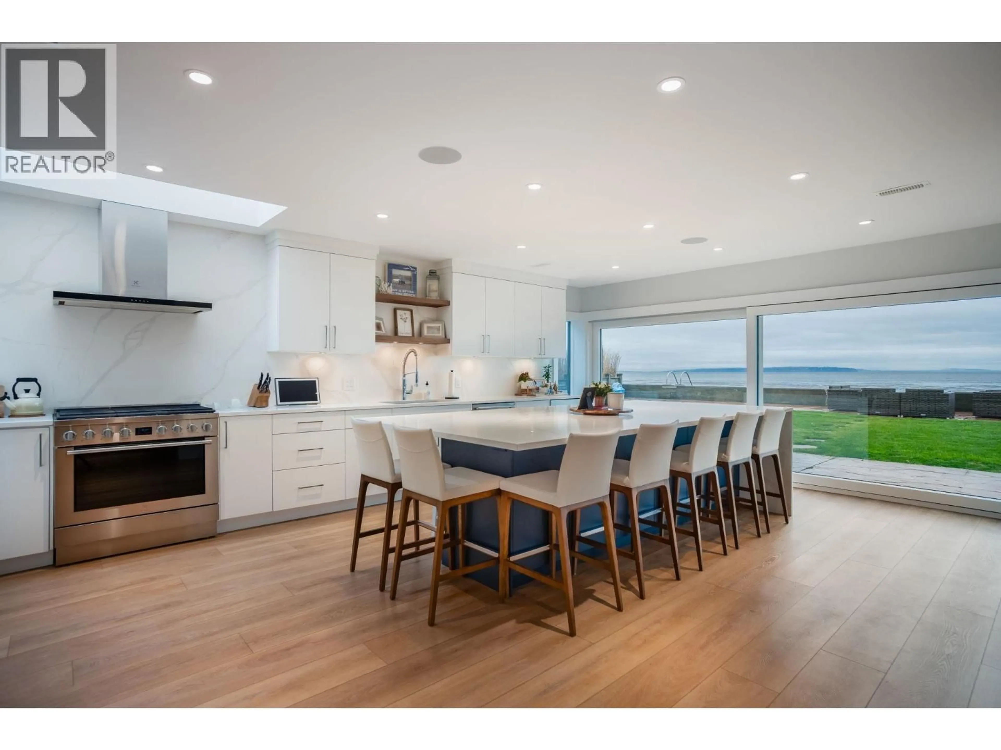 Open concept kitchen, wood/laminate floor for 1584 BEACH GROVE ROAD, Delta British Columbia V4L1N6