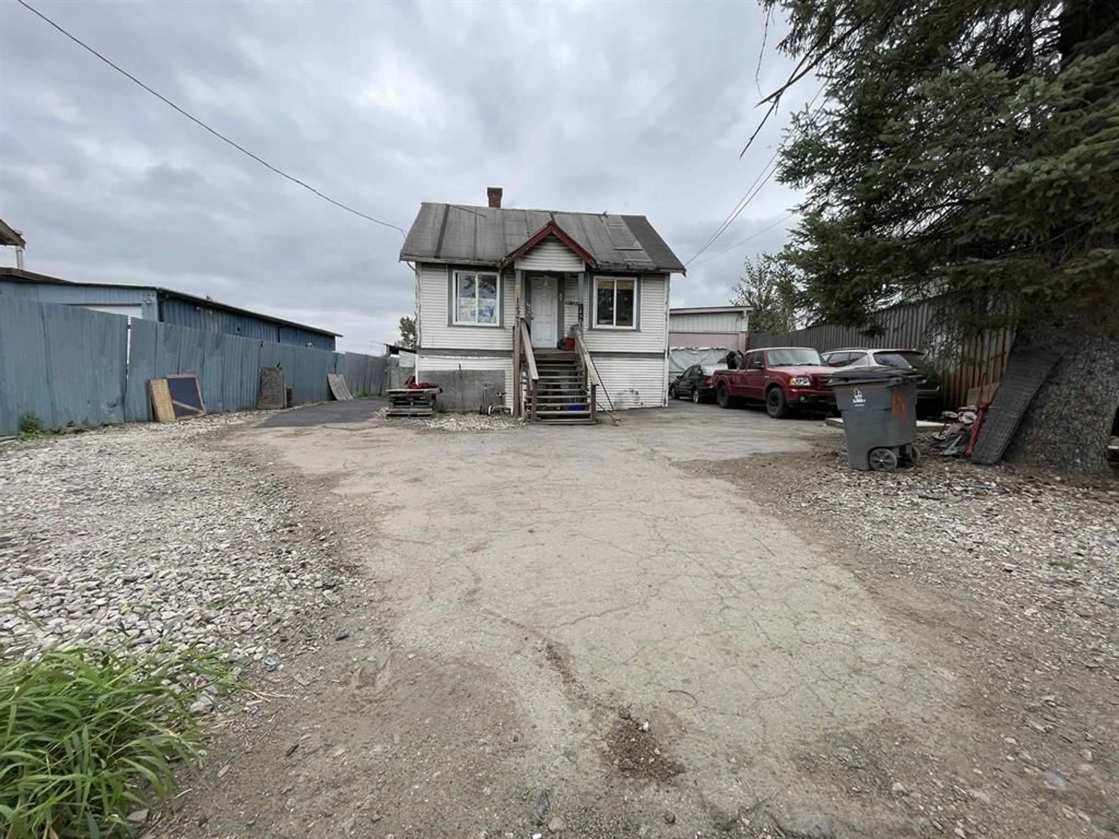 A pic from outside/outdoor area/front of a property/back of a property/a pic from drone, street for 12343 OLD YALE ROAD, Surrey British Columbia V3V3X7