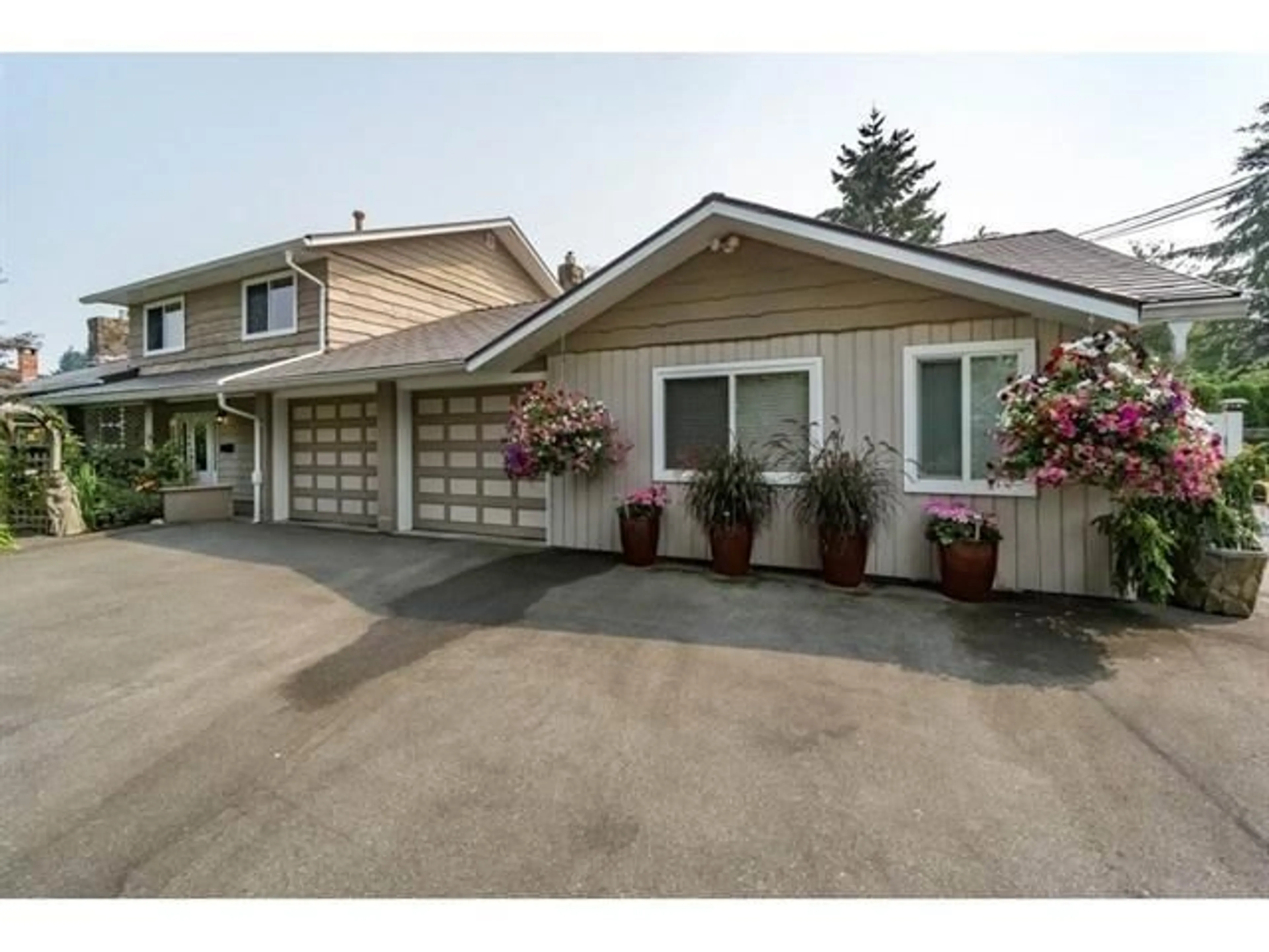 Home with vinyl exterior material, street for 7444 184 STREET, Surrey British Columbia V4N3G5