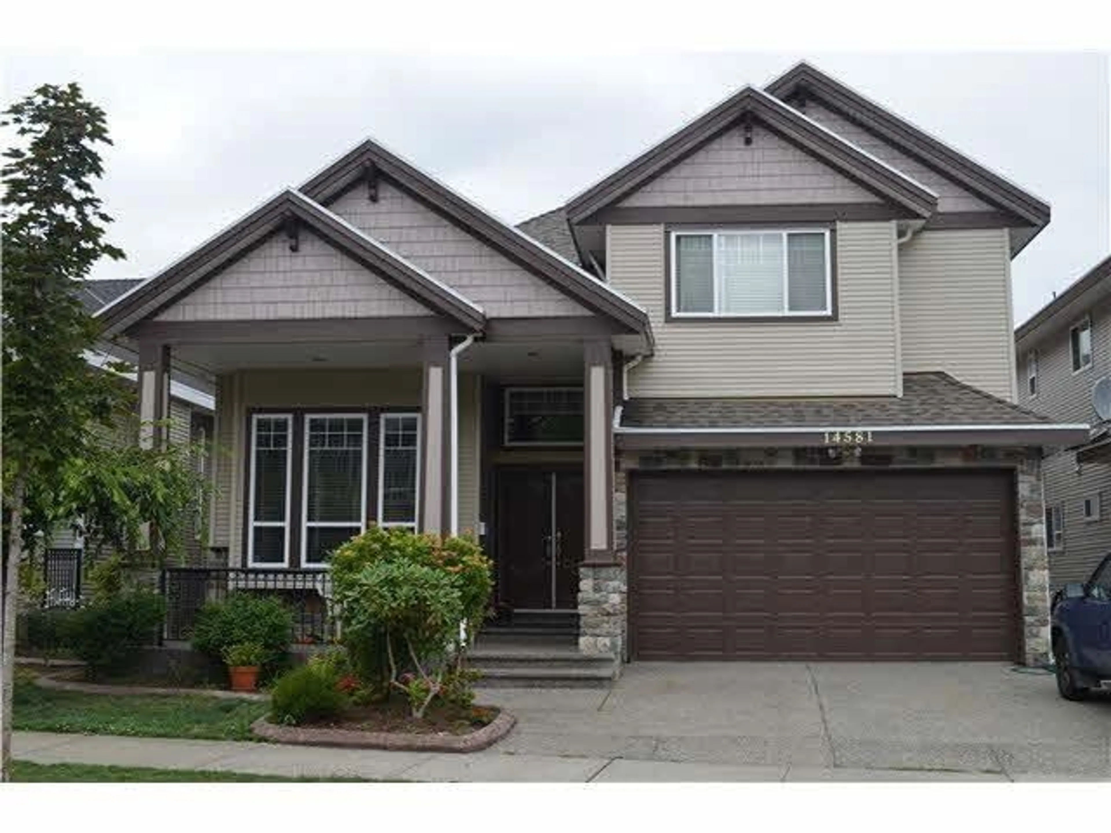 Home with vinyl exterior material, street for 14581 76A AVENUE, Surrey British Columbia V3S2P4