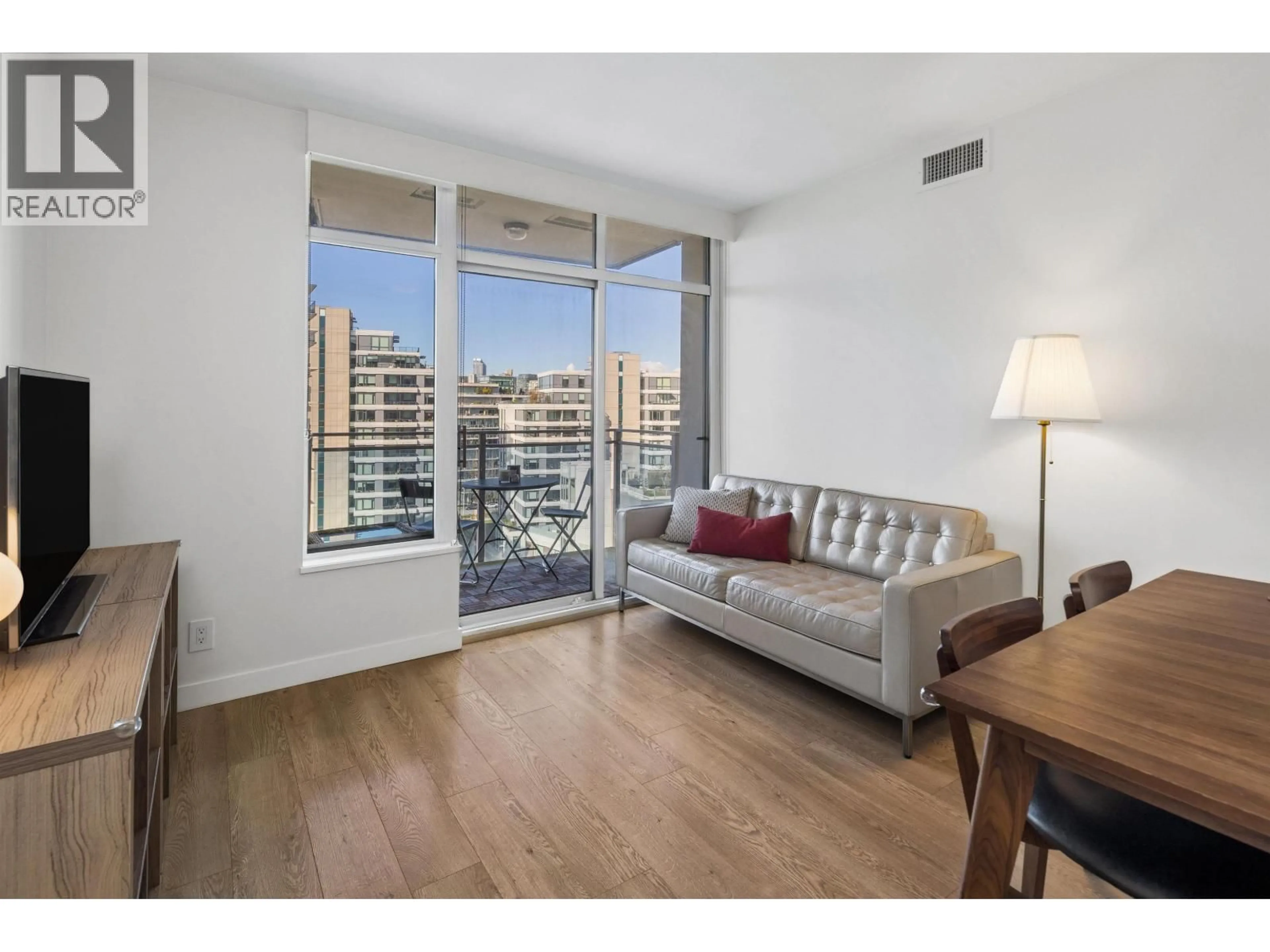 Living room with furniture, wood/laminate floor for 1209 - 111 1ST AVENUE, Vancouver British Columbia V6A0E9