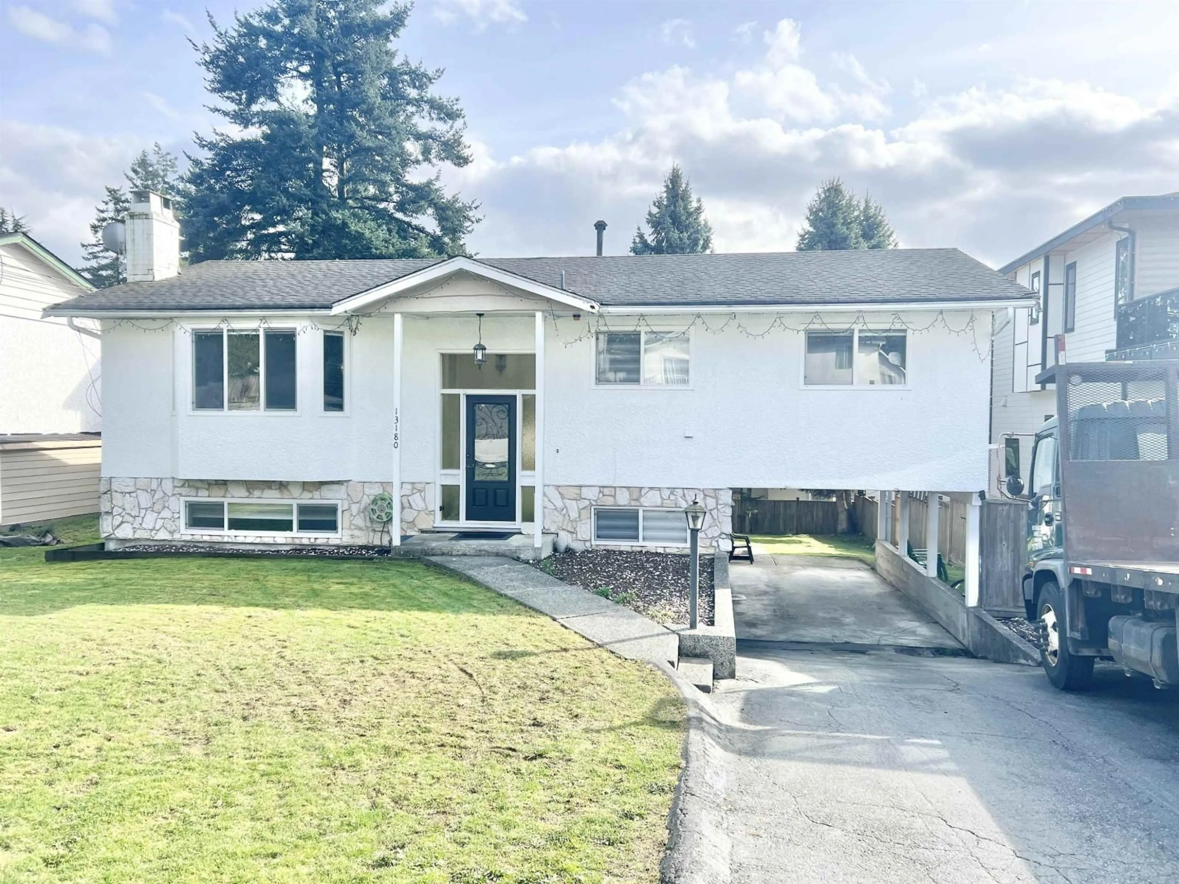 Home with vinyl exterior material, street for 13180 99 AVENUE, Surrey British Columbia V3T1E9