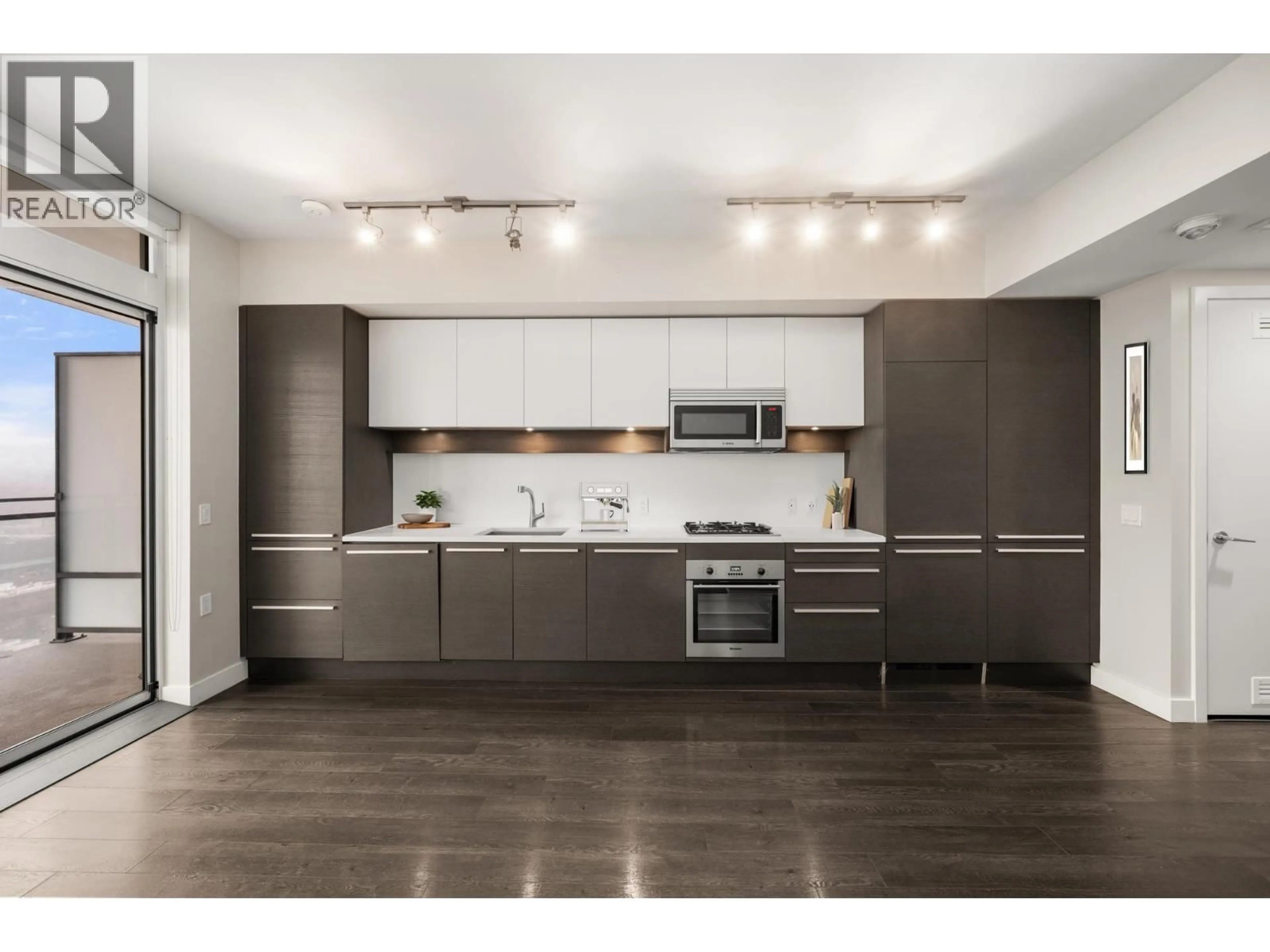 Open concept kitchen, wood/laminate floor for 2308 - 2008 ROSSER AVENUE, Burnaby British Columbia V5C0H8