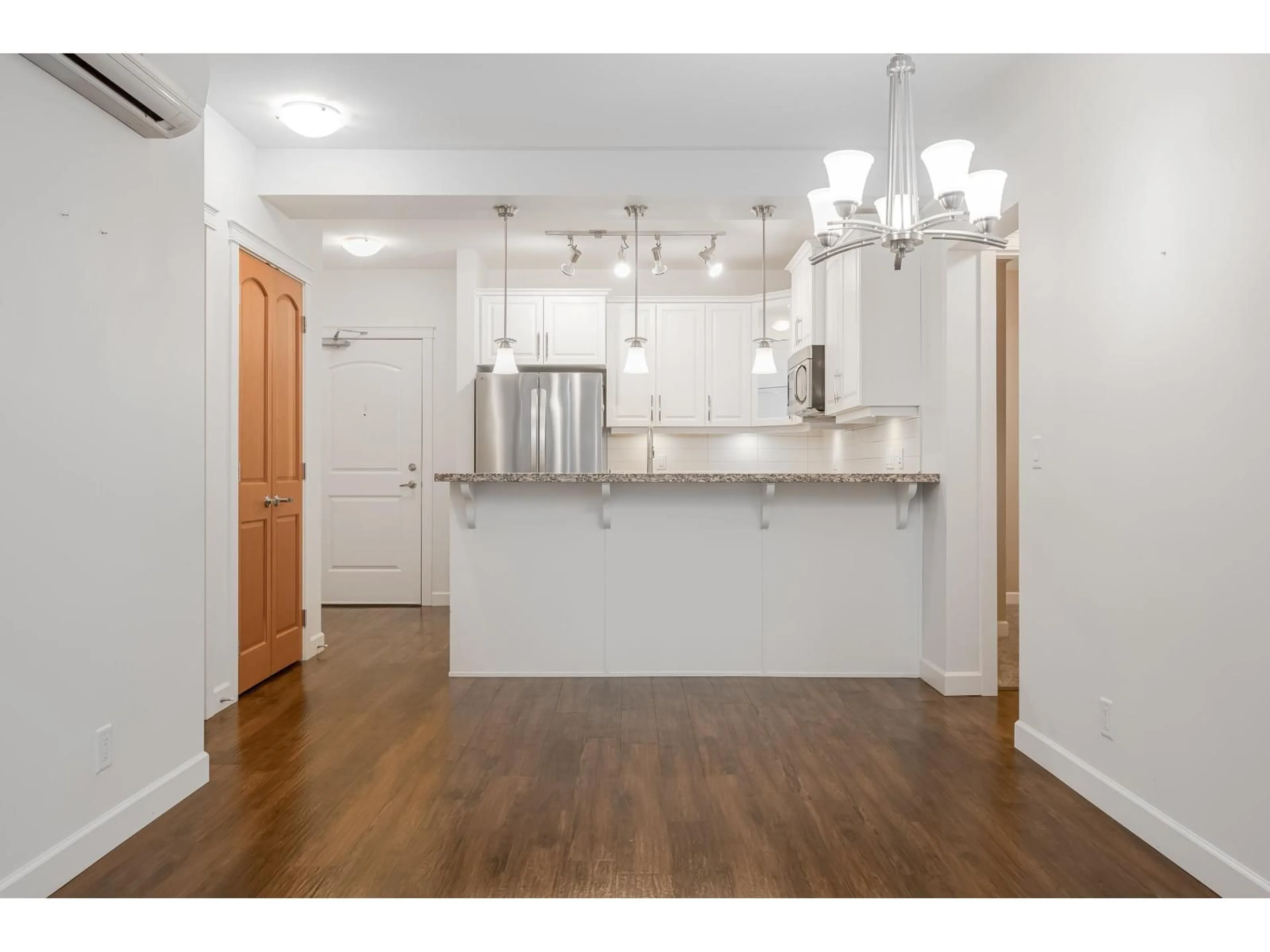 Open concept kitchen, wood/laminate floor for 165 - 8258 207A STREET, Langley British Columbia V2Y0N4
