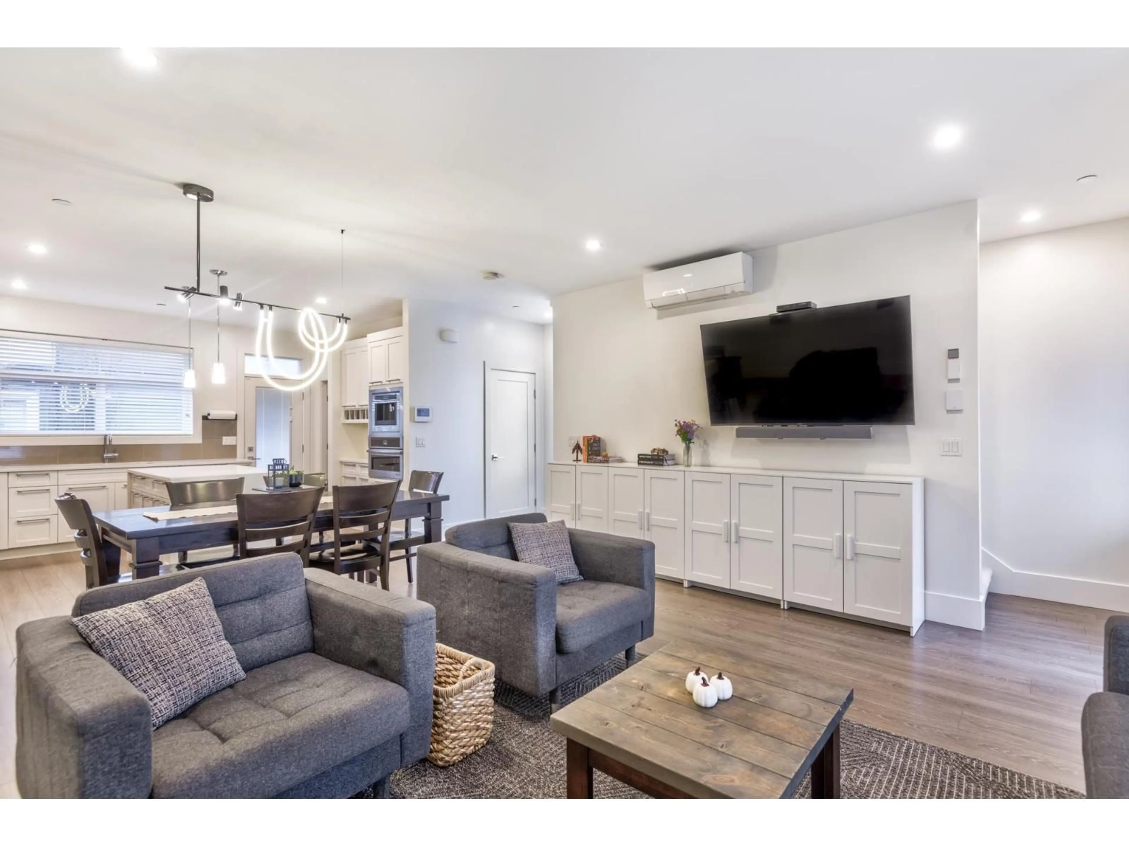 Living room with furniture, wood/laminate floor for 42 - 7665 209 STREET, Langley British Columbia V2Y0V2
