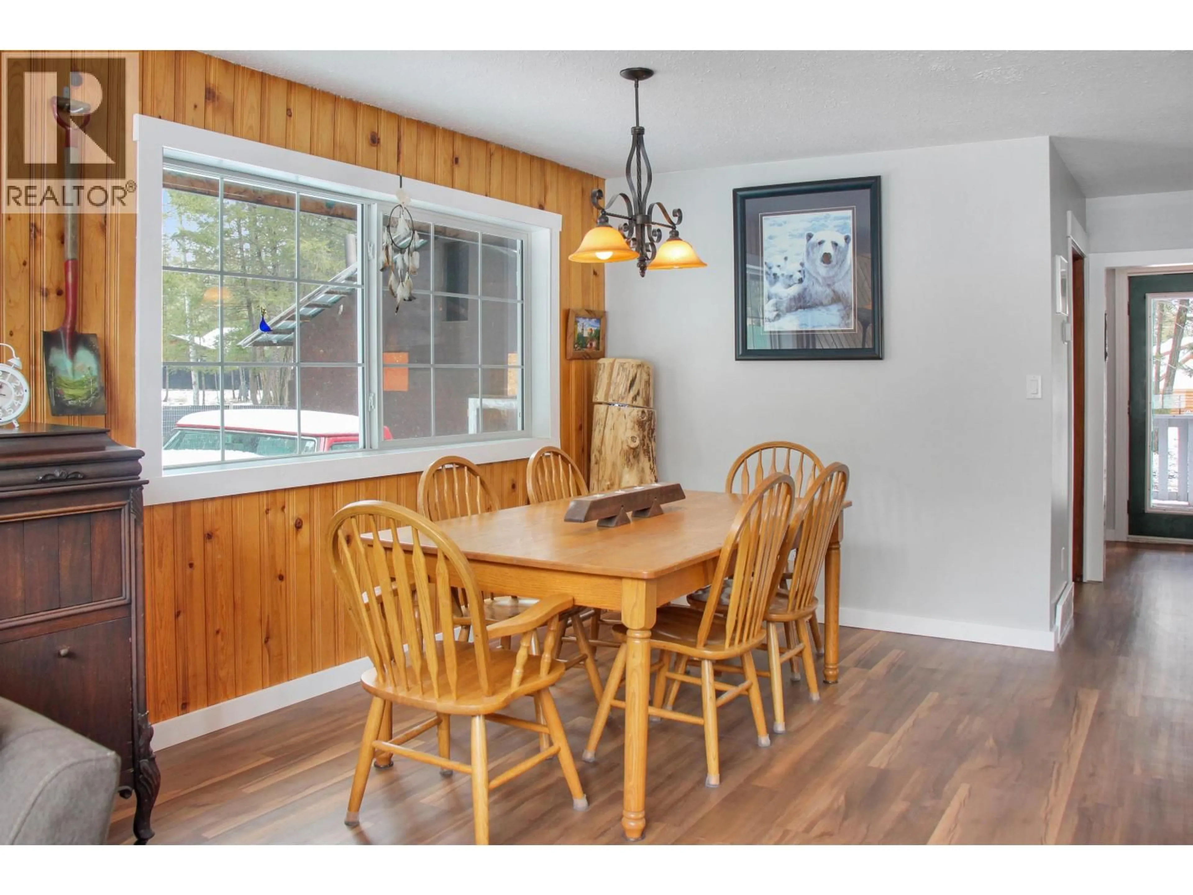 Dining room, wood/laminate floor for 4907 PEASIM COURT, 108 Mile Ranch British Columbia V0K2Z0