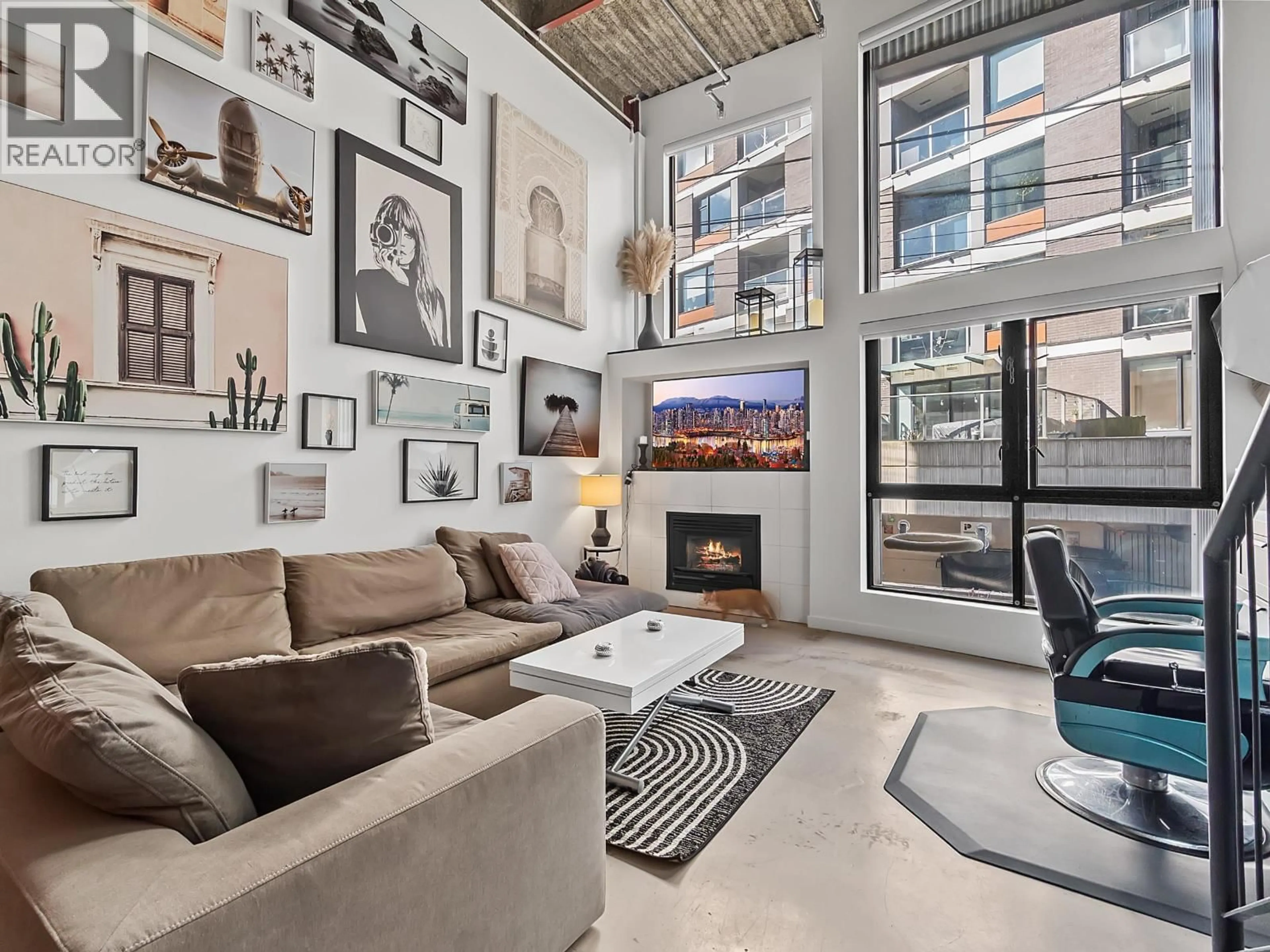 Living room with furniture, cement floor for 205 - 234 5TH AVENUE, Vancouver British Columbia V5T1H3