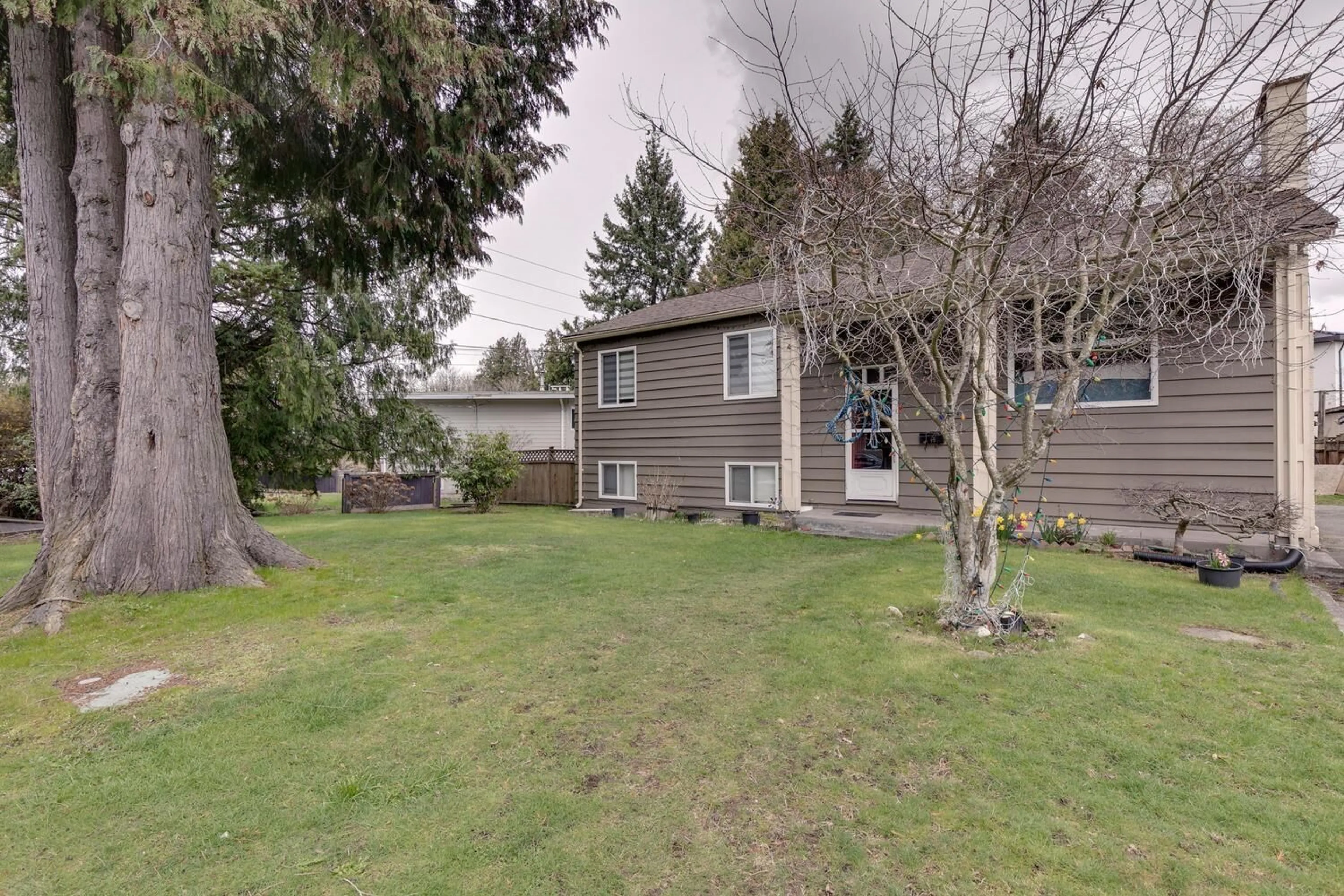 A pic from outside/outdoor area/front of a property/back of a property/a pic from drone, street for 10969 86A AVENUE, Delta British Columbia V4C2Y3