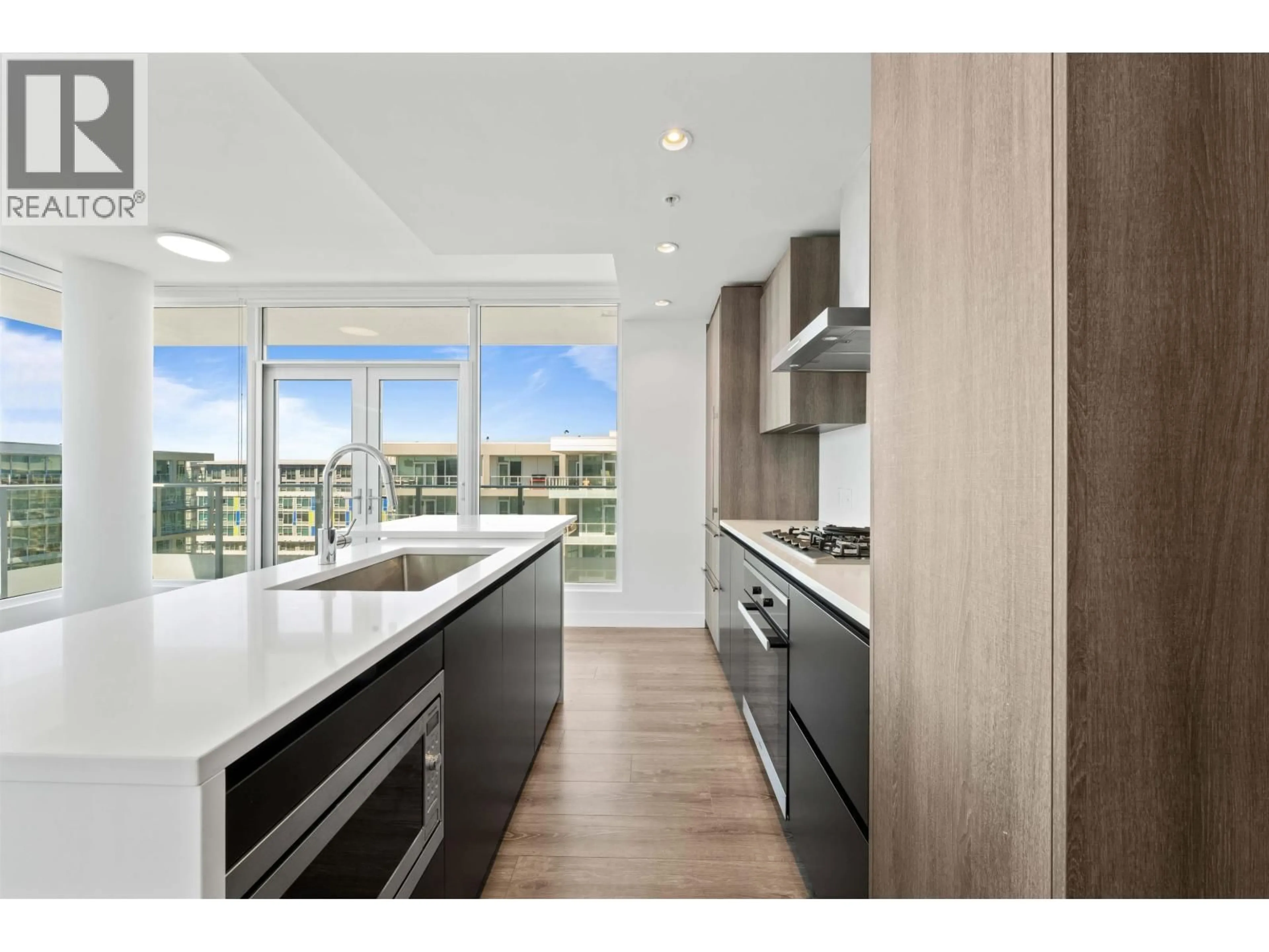 Open concept kitchen, wood/laminate floor for 1511 - 8133 COOK ROAD, Richmond British Columbia V6Y0L7