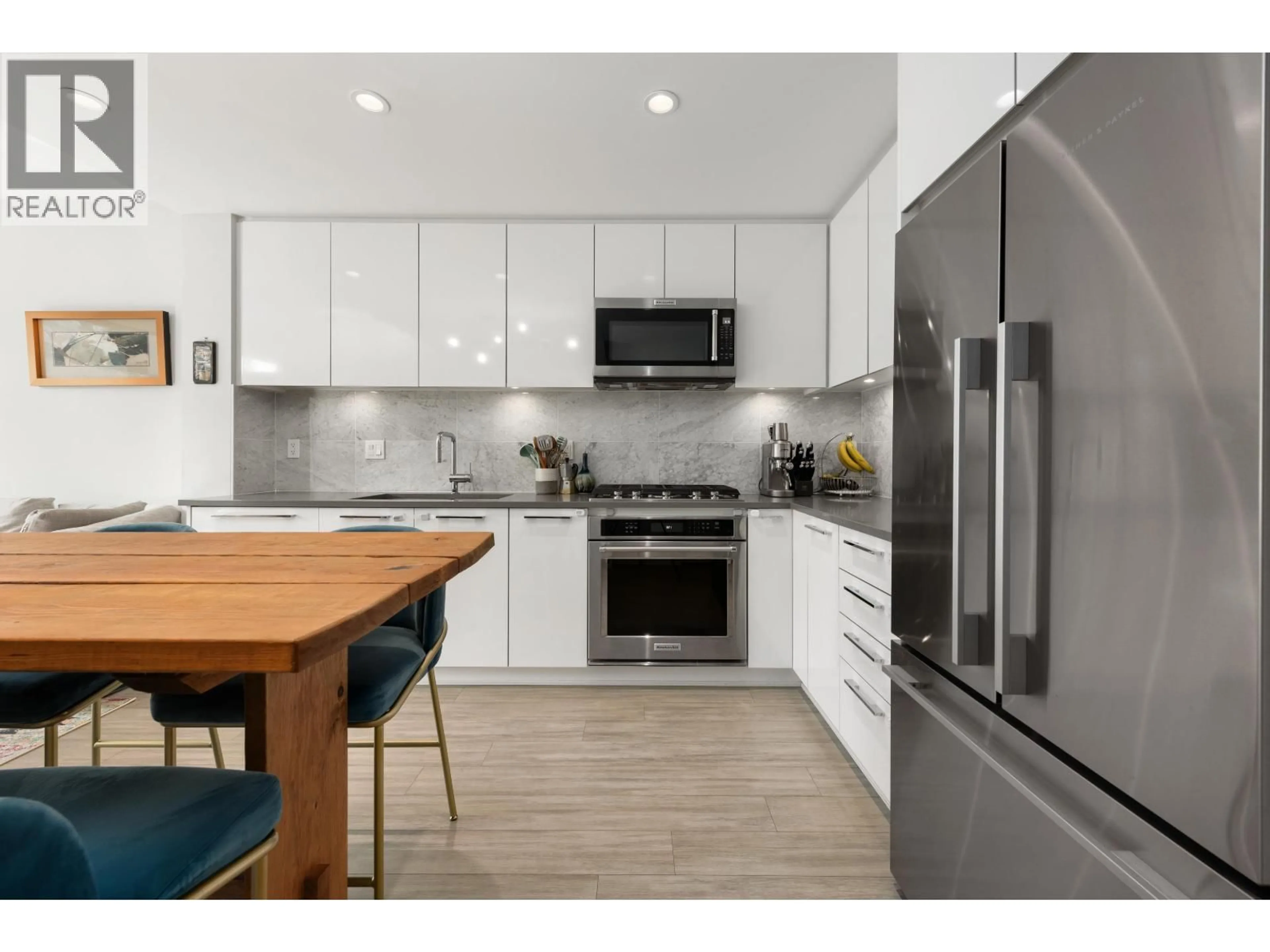 Open concept kitchen, unknown for 311 - 2651 LIBRARY LANE, North Vancouver British Columbia V7J0C1