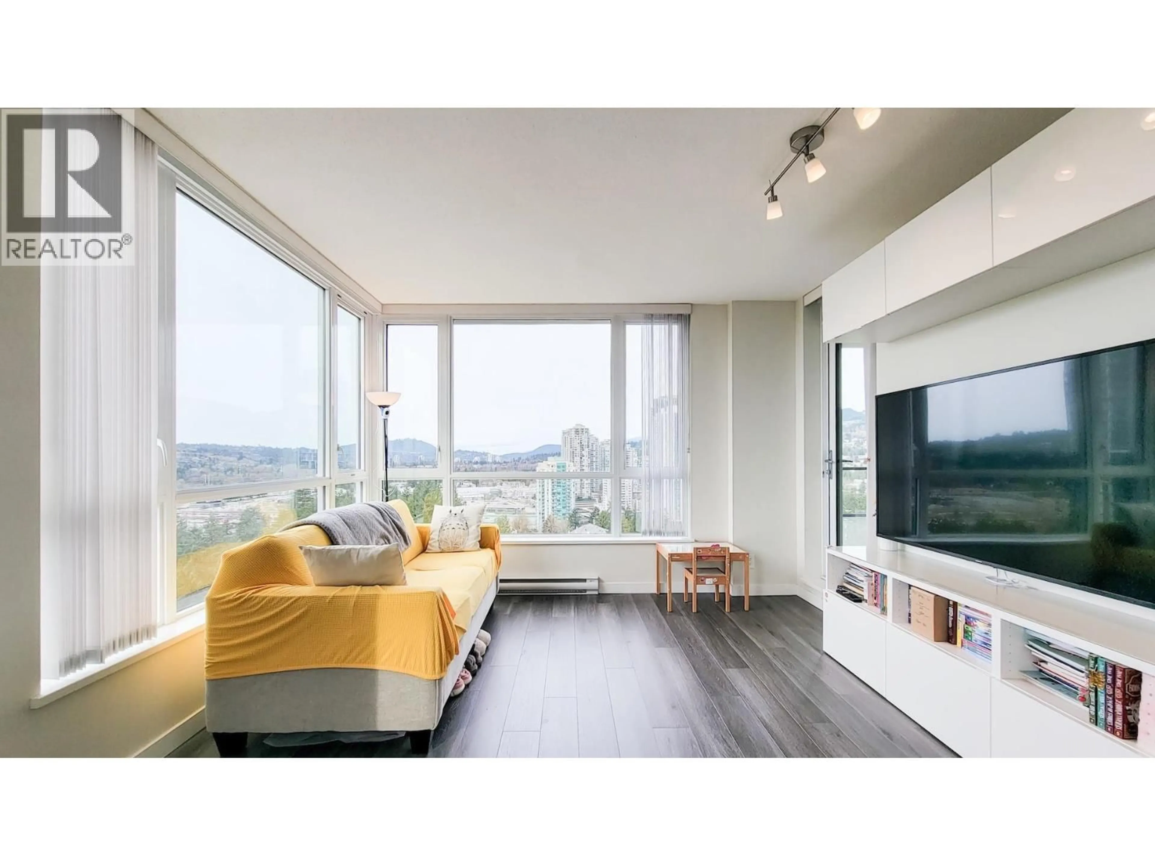 Living room with furniture, wood/laminate floor for 2204 - 3096 WINDSOR GATE, Coquitlam British Columbia V3B0P4