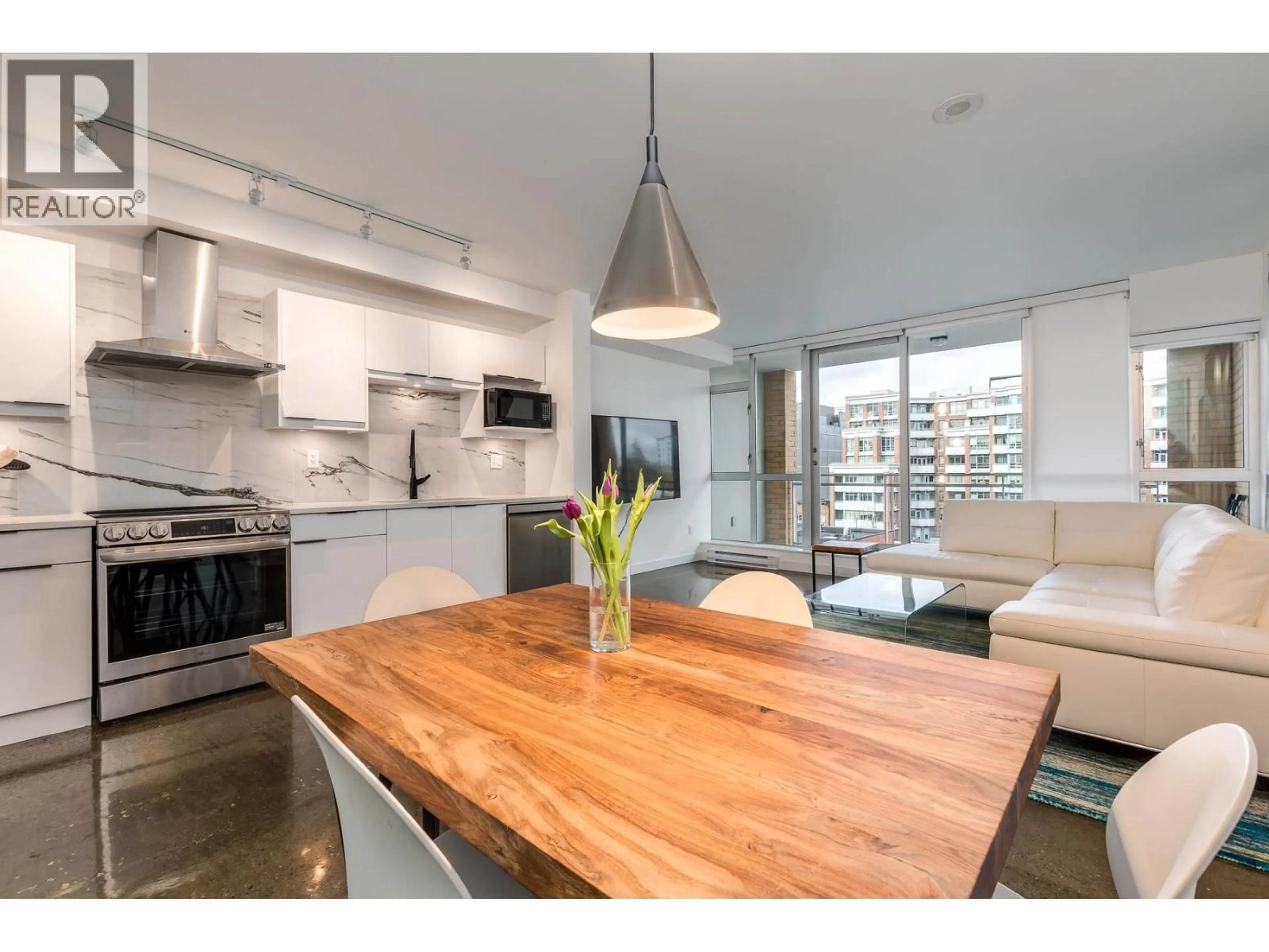 Open concept kitchen, wood/laminate floor for 714 - 221 UNION STREET, Vancouver British Columbia V6A0B4