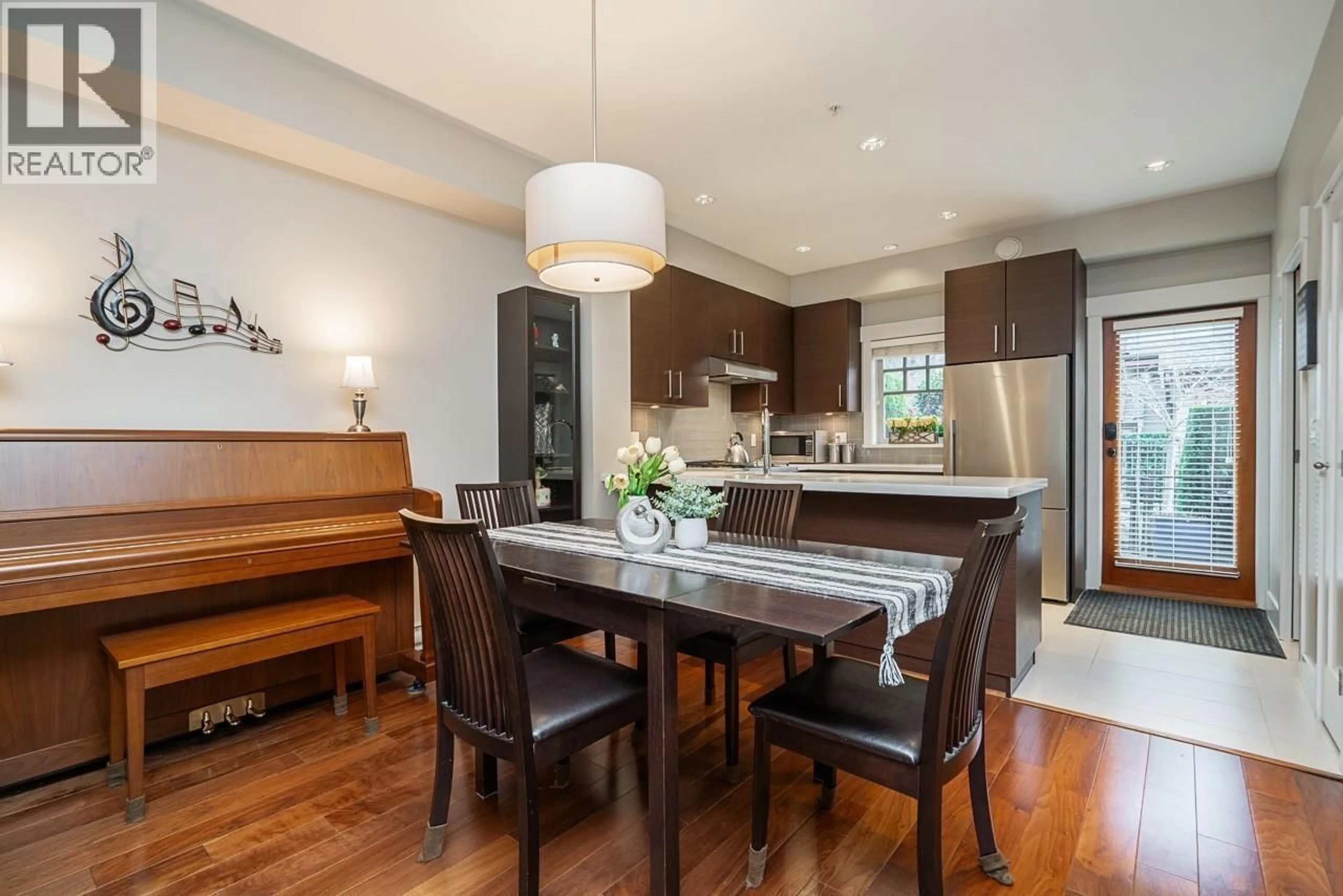Open concept kitchen, wood/laminate floor for 5946 OAK STREET, Vancouver British Columbia V6M2W2