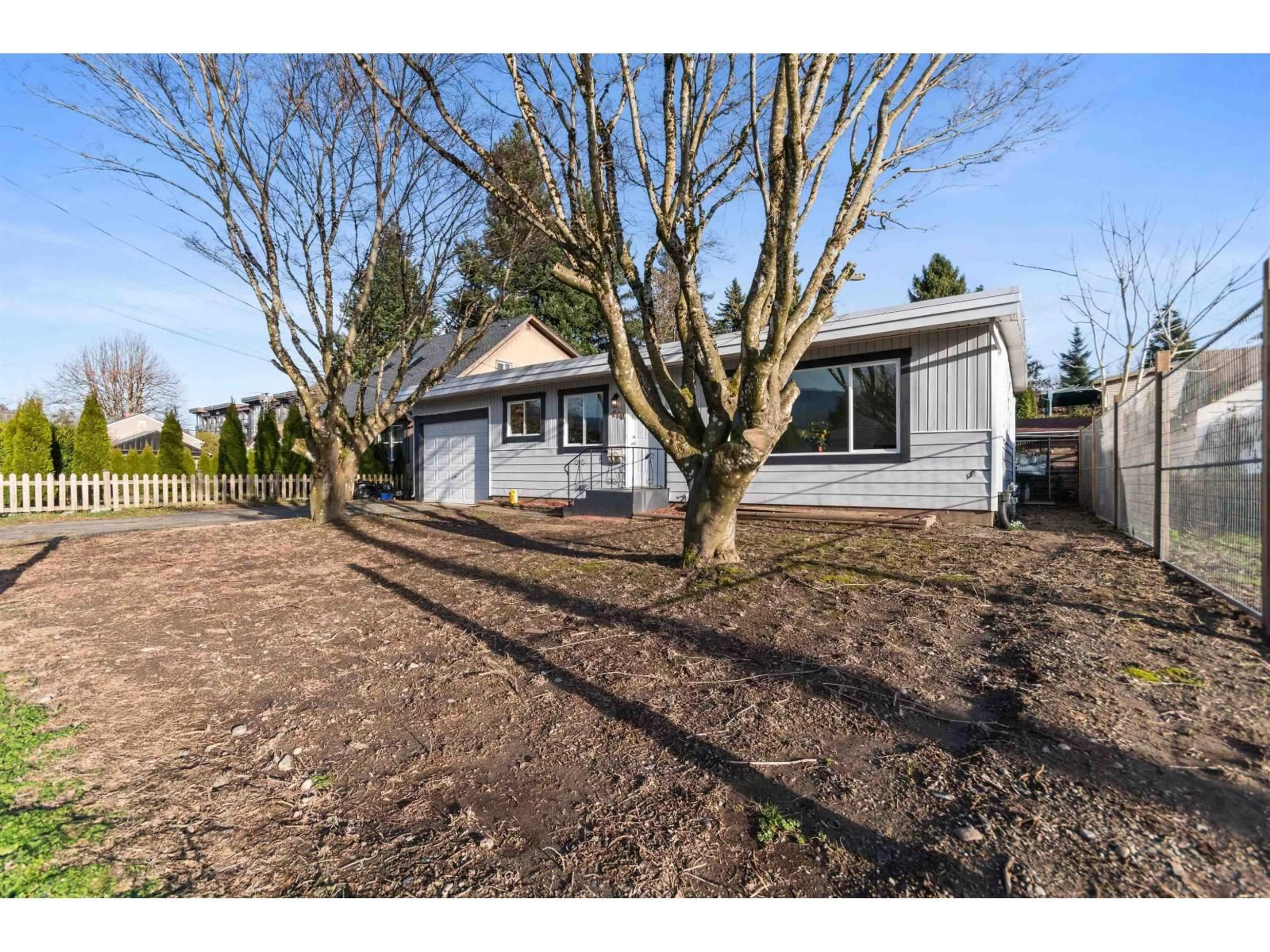 A pic from outside/outdoor area/front of a property/back of a property/a pic from drone, street for 9410 CORBOULD STREET, Chilliwack British Columbia V2P3Z9
