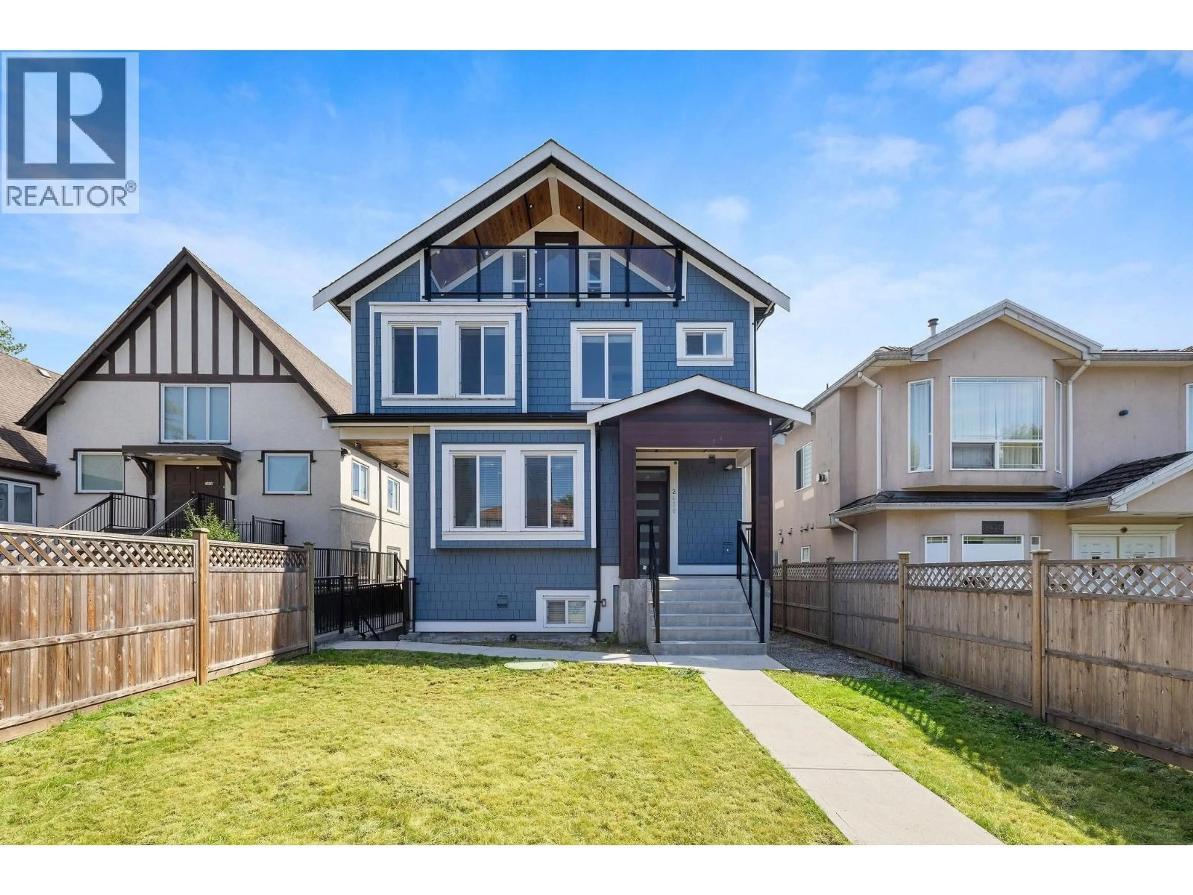 Home with vinyl exterior material, street for 1 - 2430 41 STREET, Vancouver British Columbia V5R2W4