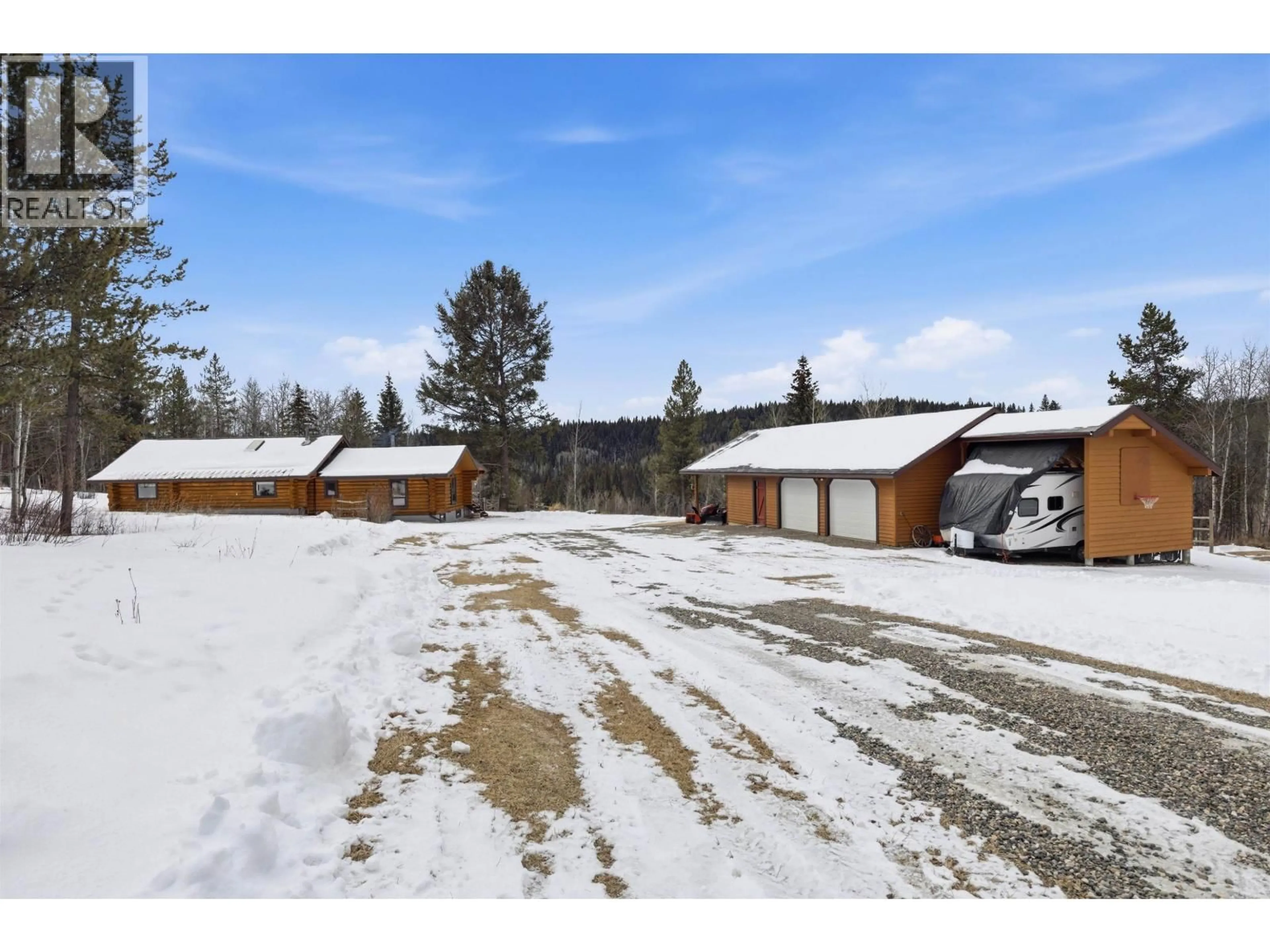A pic from outside/outdoor area/front of a property/back of a property/a pic from drone, unknown for 2815 PIONEER CRESCENT, 150 Mile House British Columbia V0K2G0