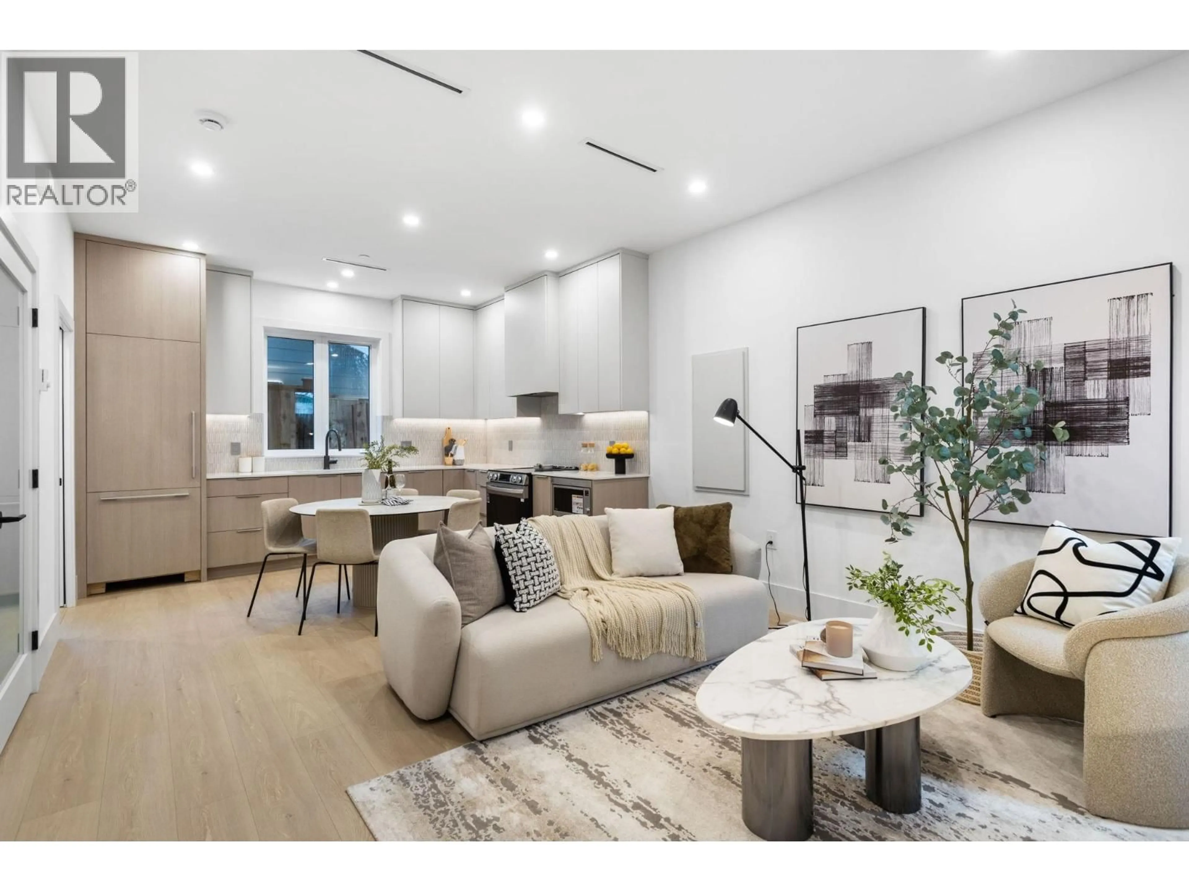 Living room with furniture, wood/laminate floor for 3277 GRAVELEY STREET, Vancouver British Columbia V5K3K8