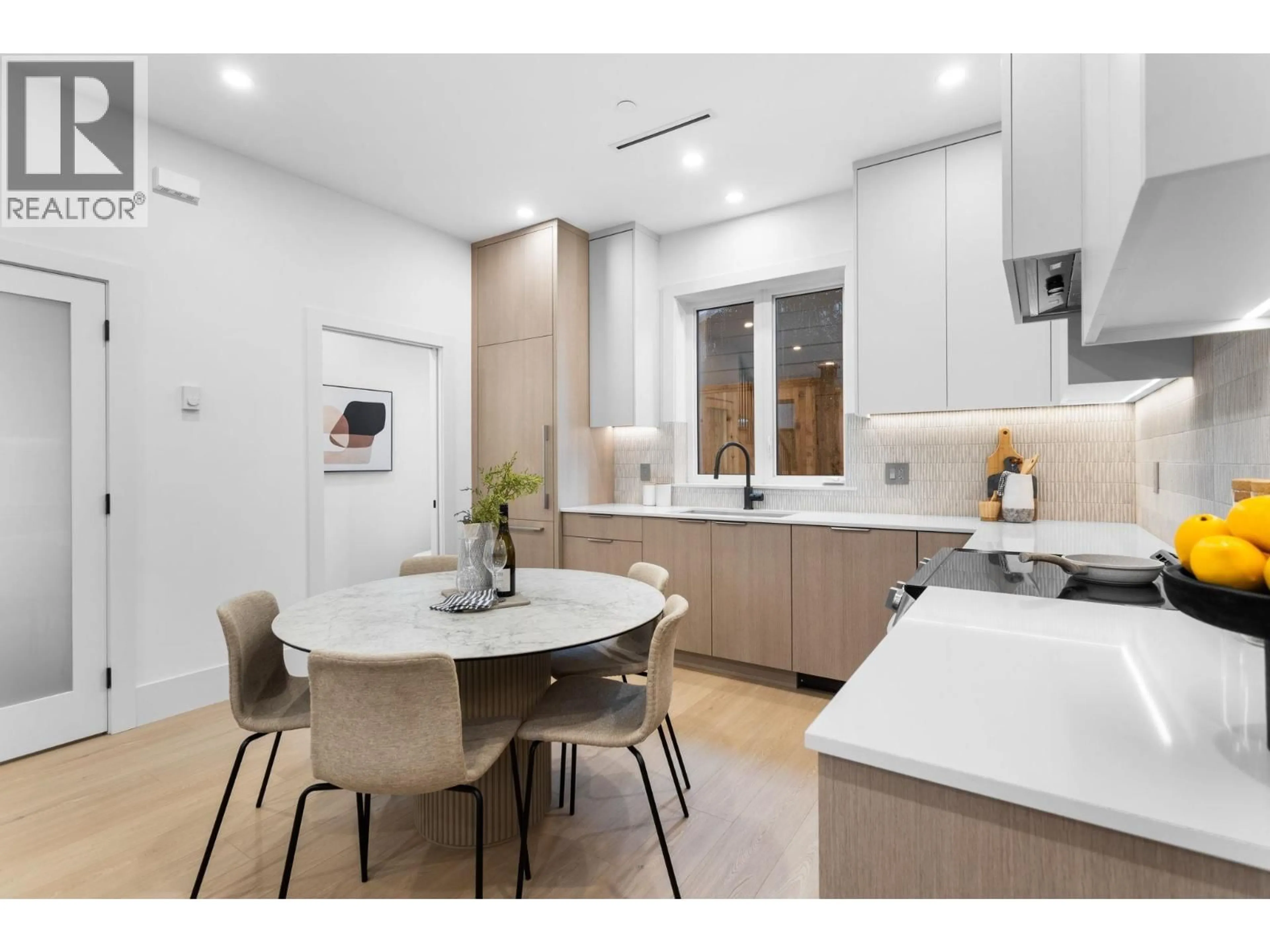 Open concept kitchen, ceramic/tile floor for 3277 GRAVELEY STREET, Vancouver British Columbia V5K3K8