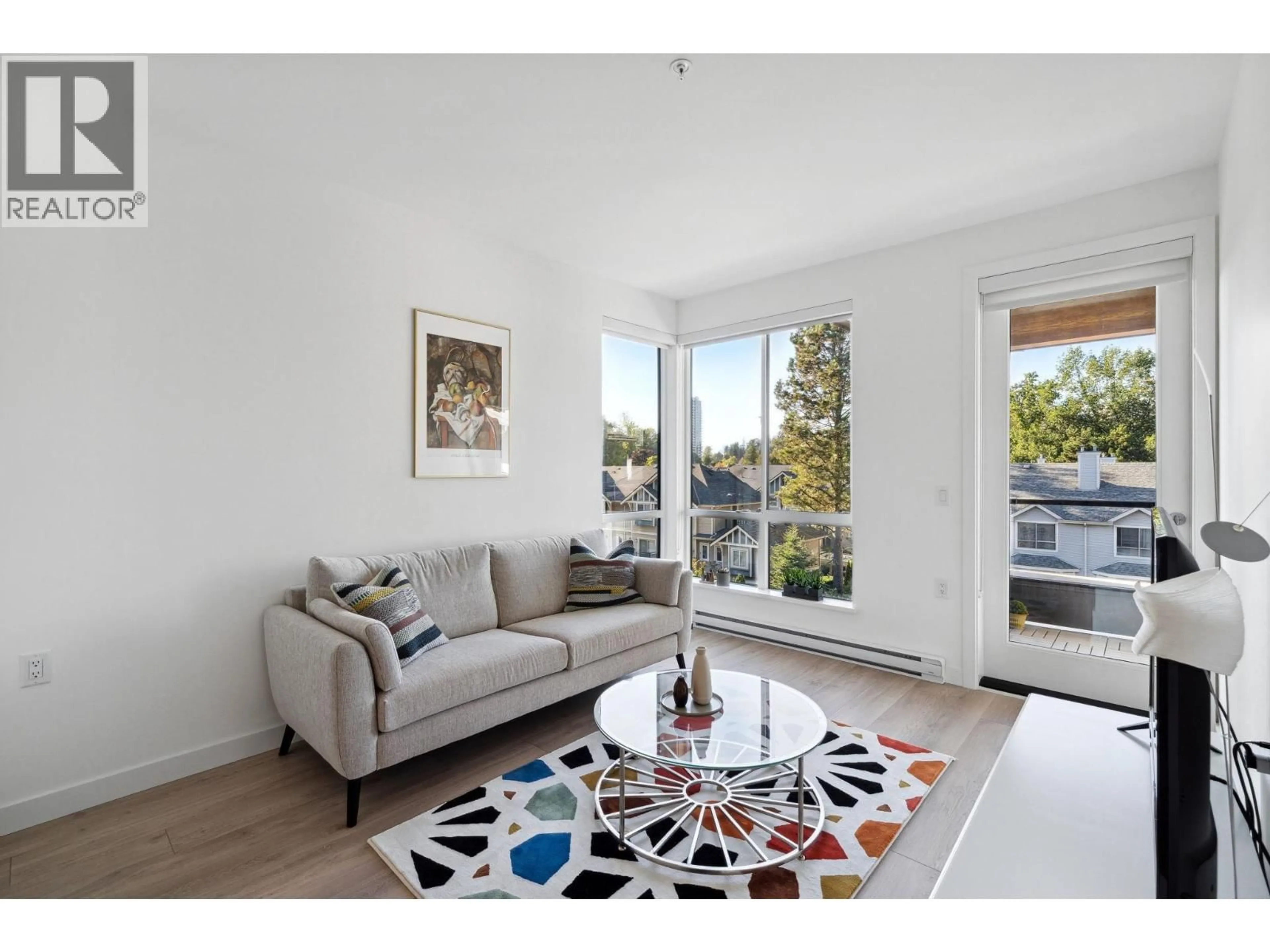 Living room with furniture, wood/laminate floor for 417 - 7579 16TH STREET, Burnaby British Columbia V3N0H7