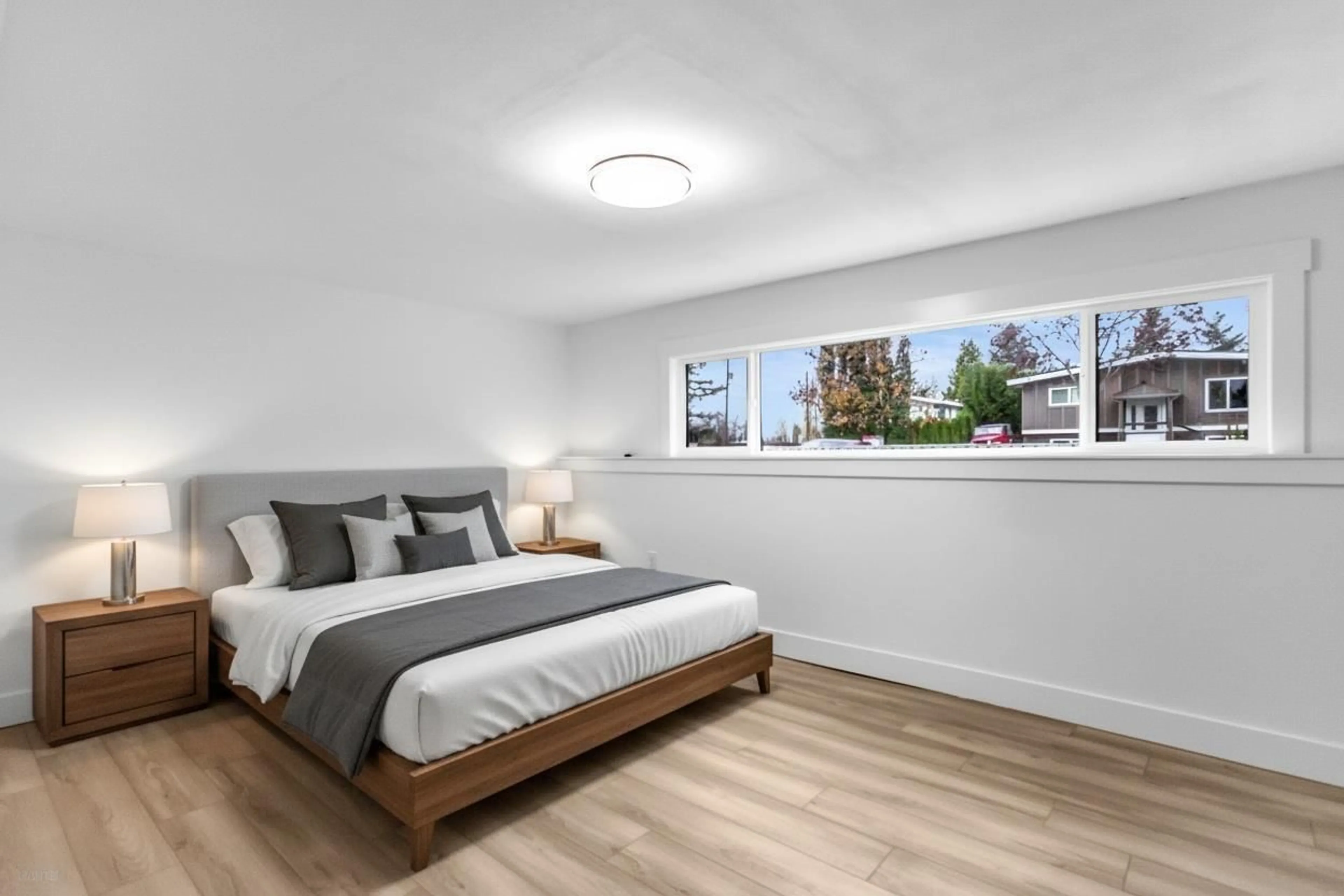 Bedroom with bed, wood/laminate floor for 45122 BALMORAL AVENUE, Chilliwack British Columbia V2R3G8