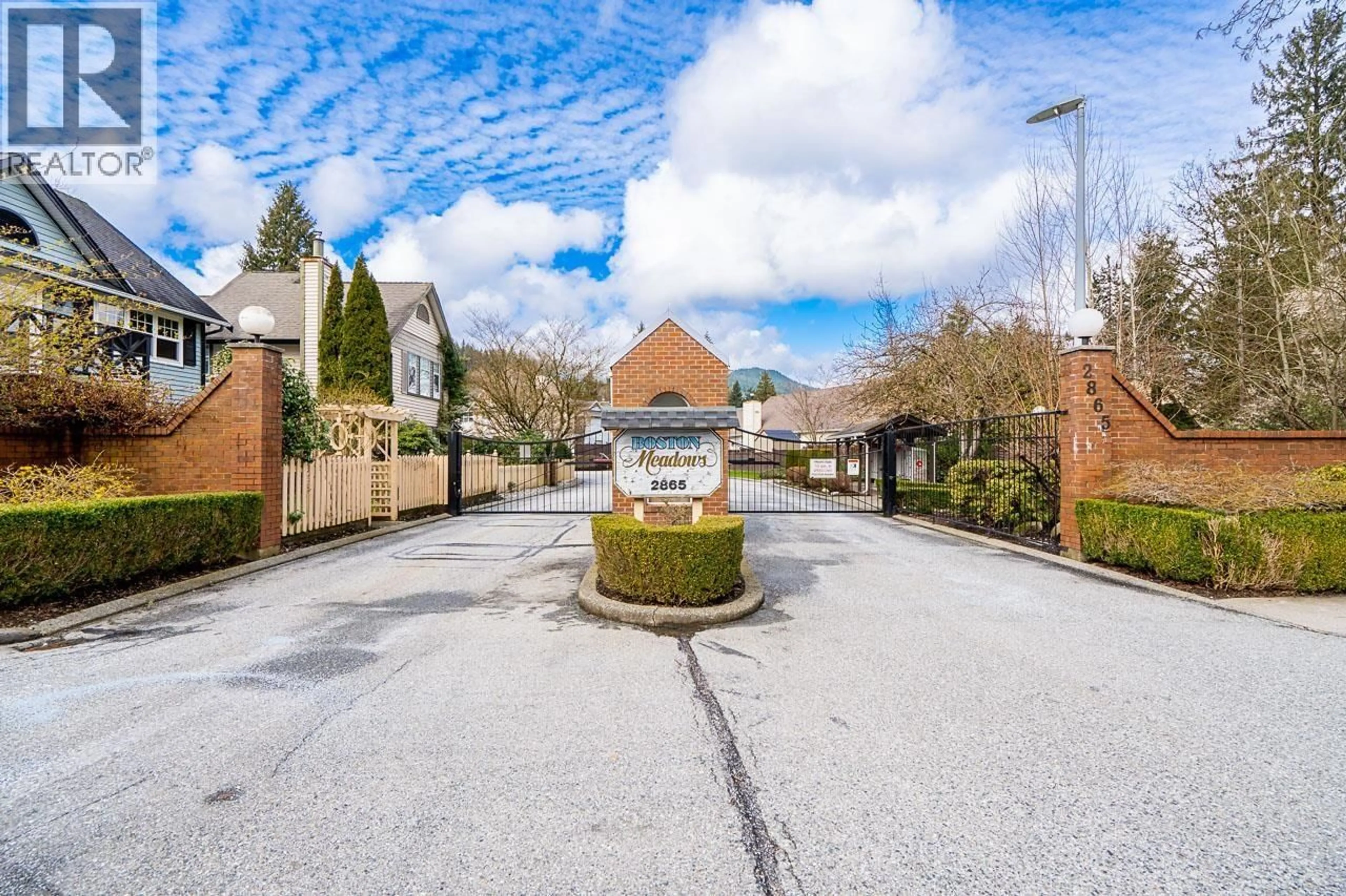 A pic from outside/outdoor area/front of a property/back of a property/a pic from drone, street for 18 - 2865 GLEN DRIVE, Coquitlam British Columbia V3B6Y8