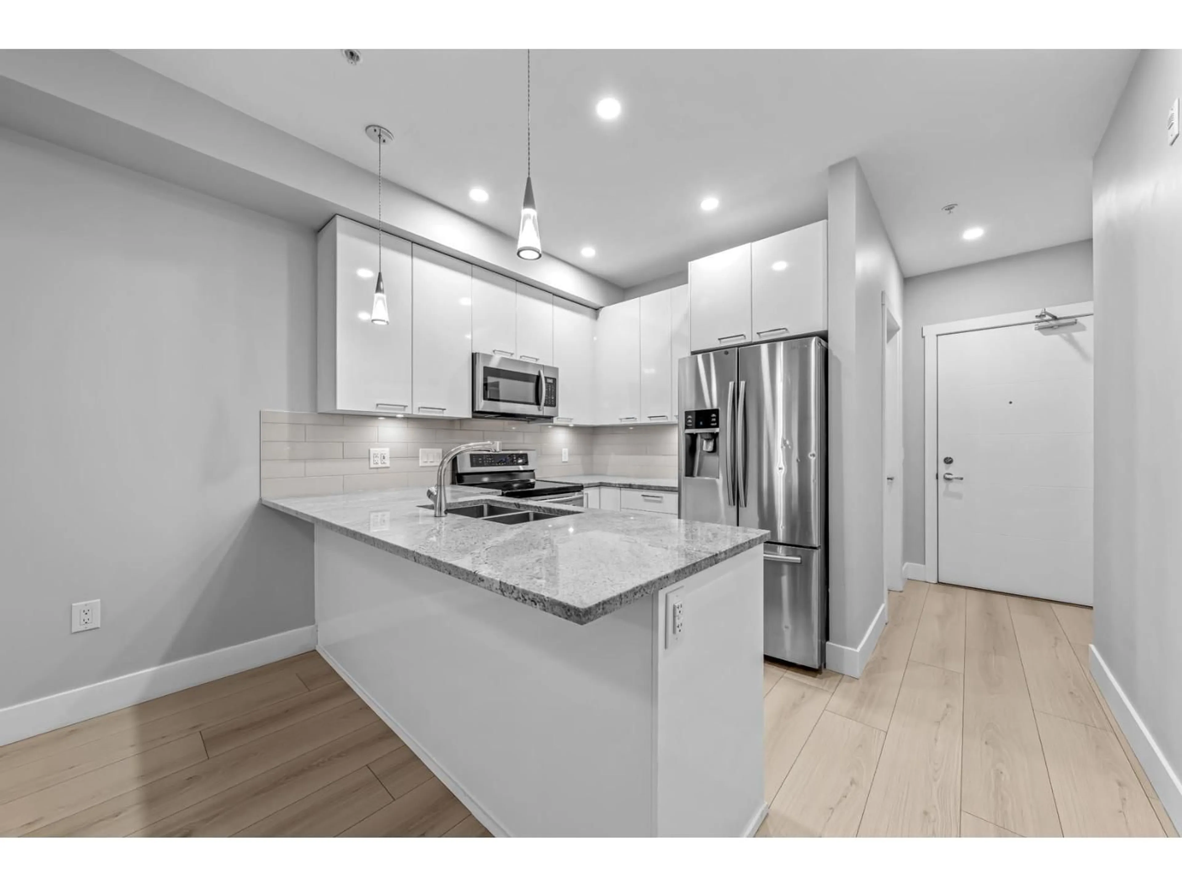 Open concept kitchen, unknown for 208 - 20175 53 AVENUE, Langley British Columbia V3A0J8