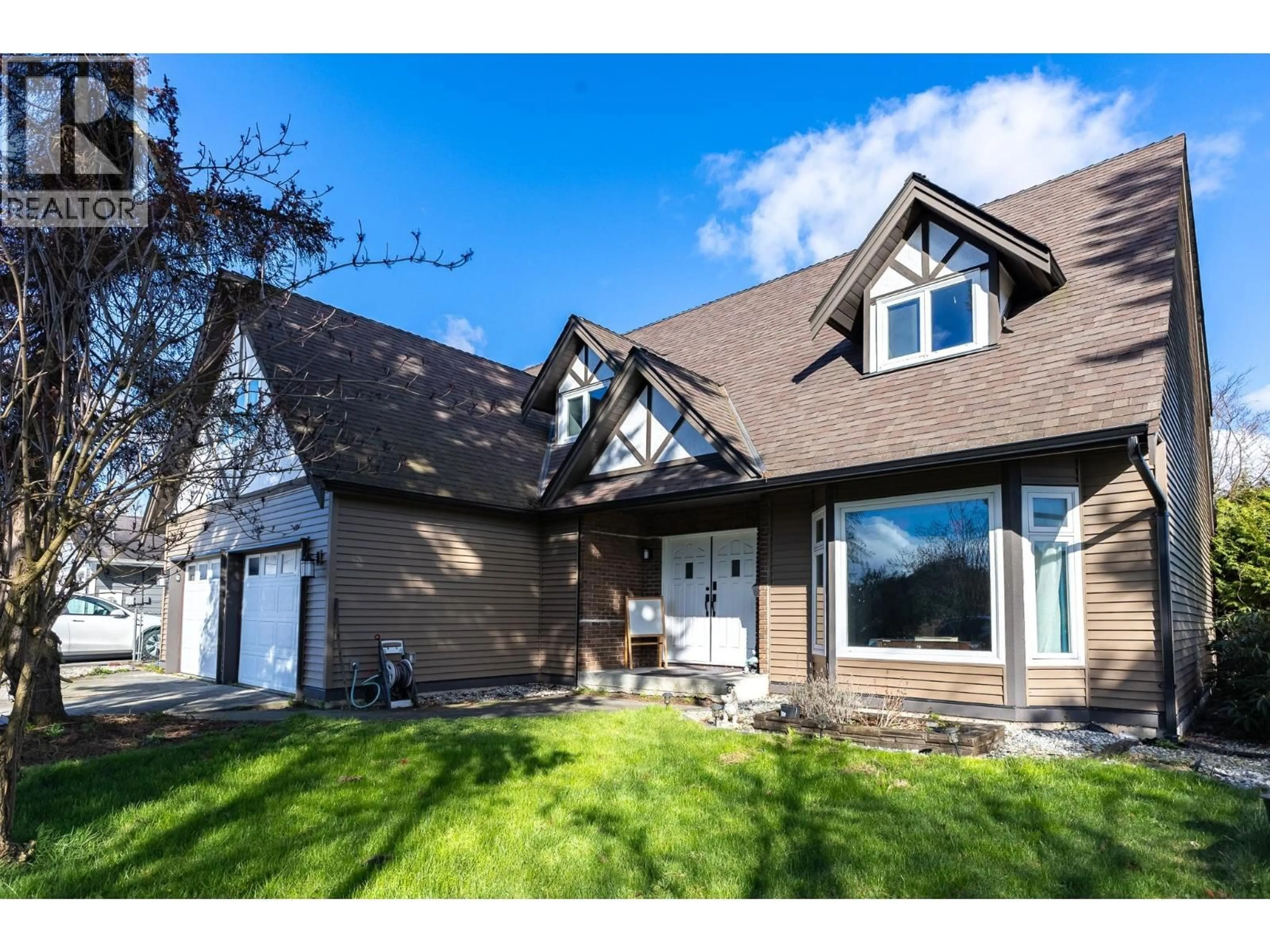 Home with vinyl exterior material, street for 6341 43A AVENUE, Delta British Columbia V4K1B3