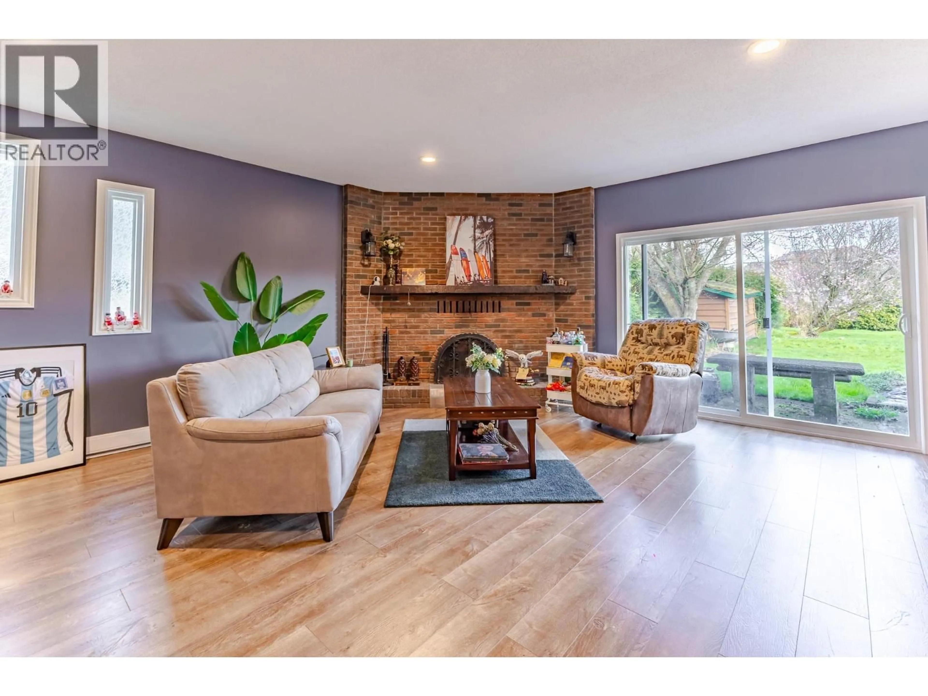 Living room with furniture, wood/laminate floor for 6341 43A AVENUE, Delta British Columbia V4K1B3