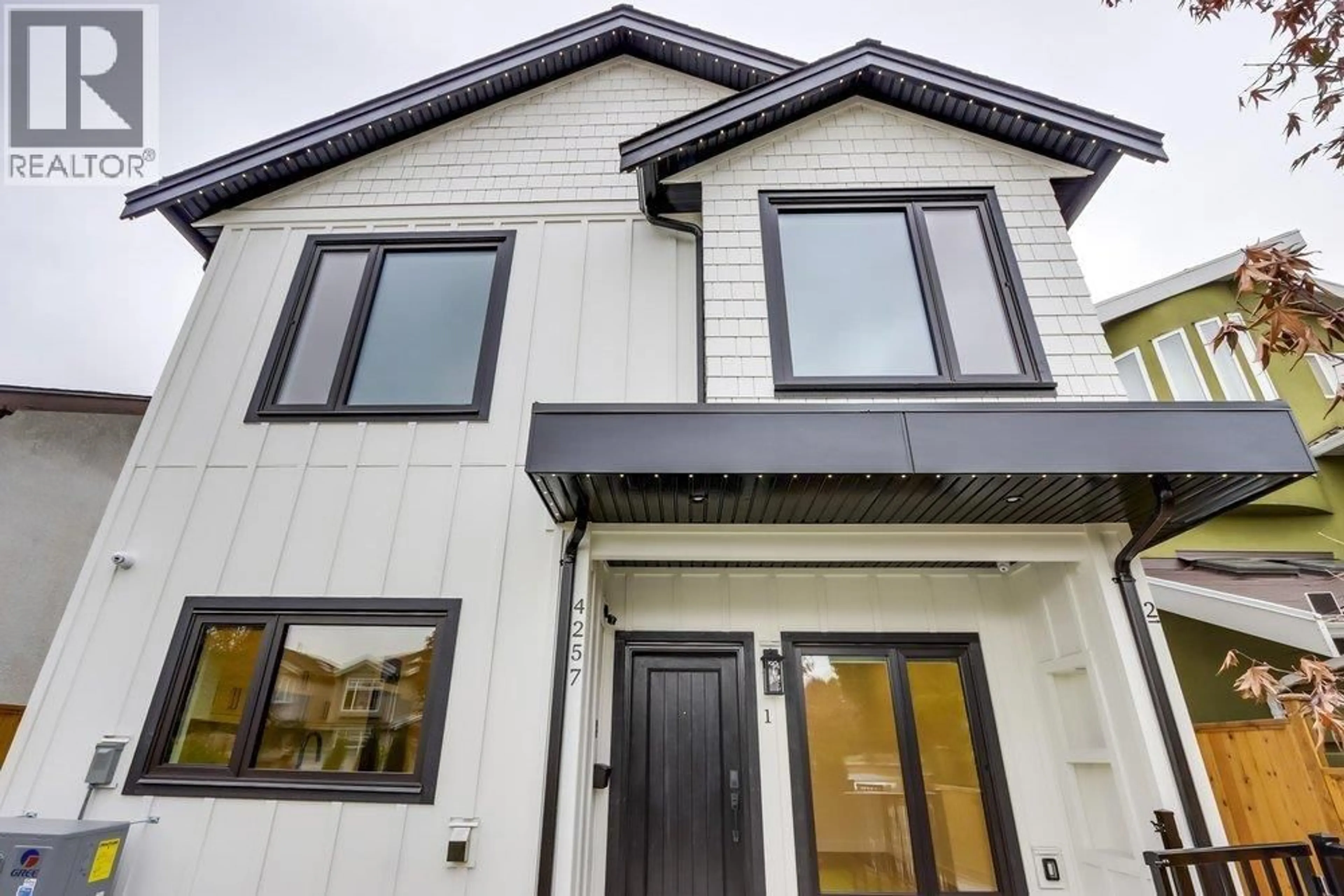 Home with vinyl exterior material, street for 1 - 4257 KNIGHT STREET, Vancouver British Columbia V5N3M3