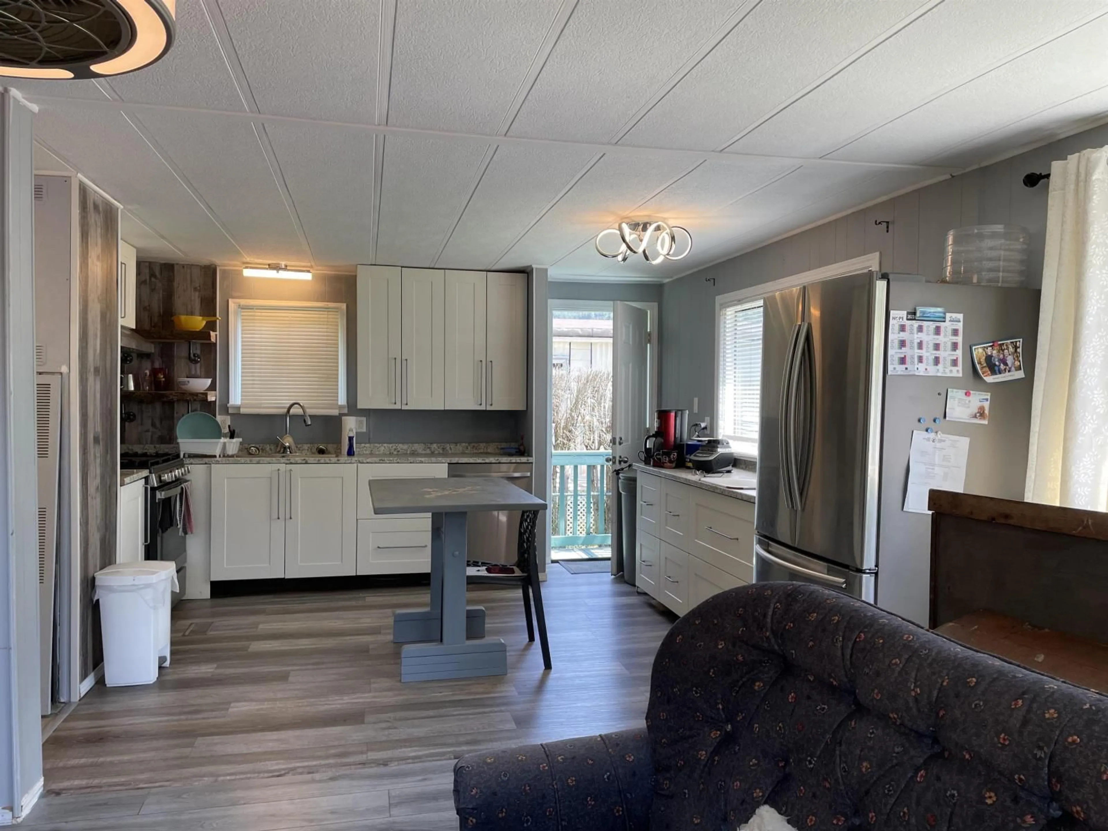 Open concept kitchen, wood/laminate floor for 52 - 65367 KAWKAWA LAKE ROAD, Hope British Columbia V0X1L1