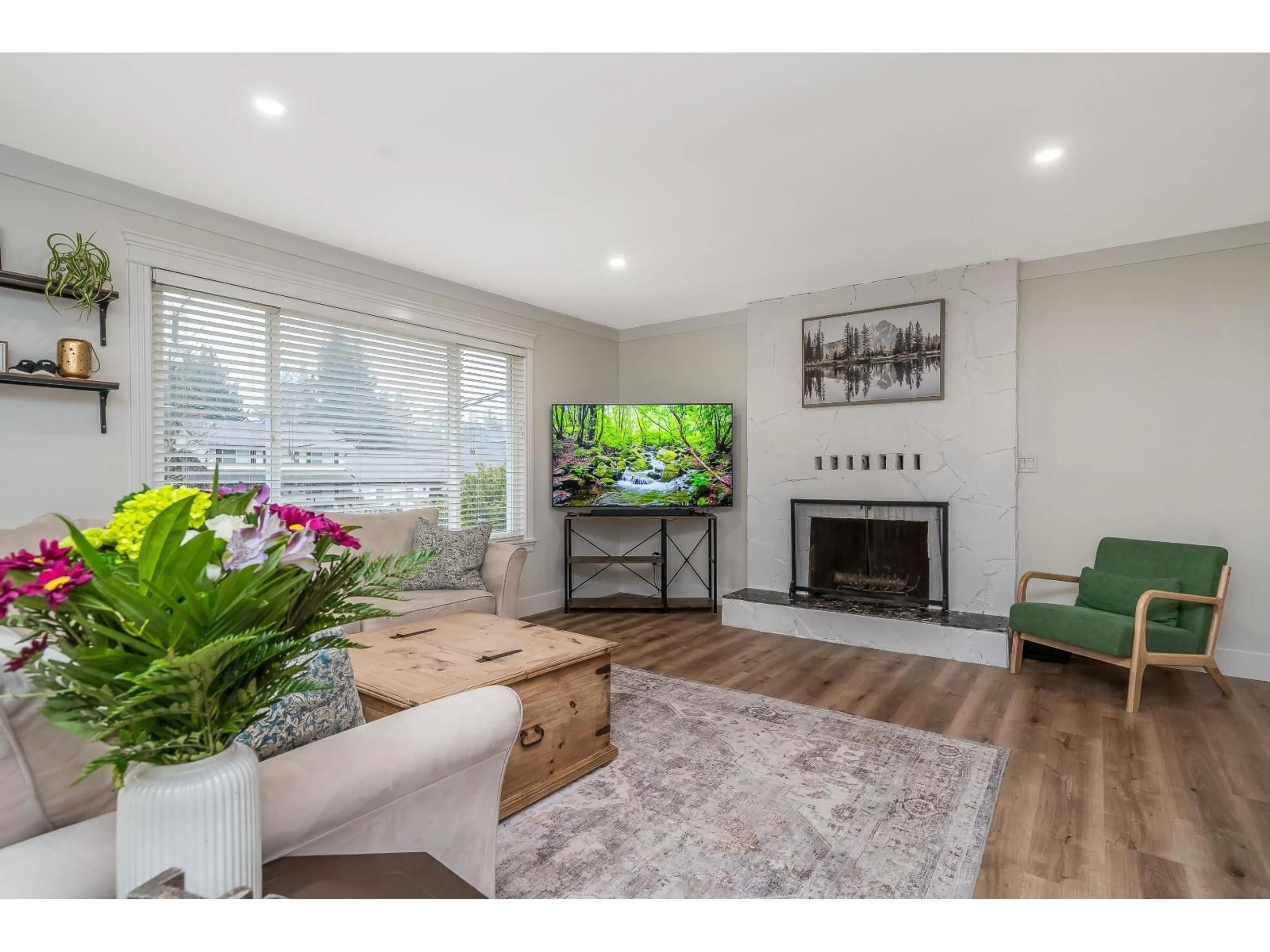 Living room with furniture, wood/laminate floor for 5751 246B STREET, Langley British Columbia V2Z1H2