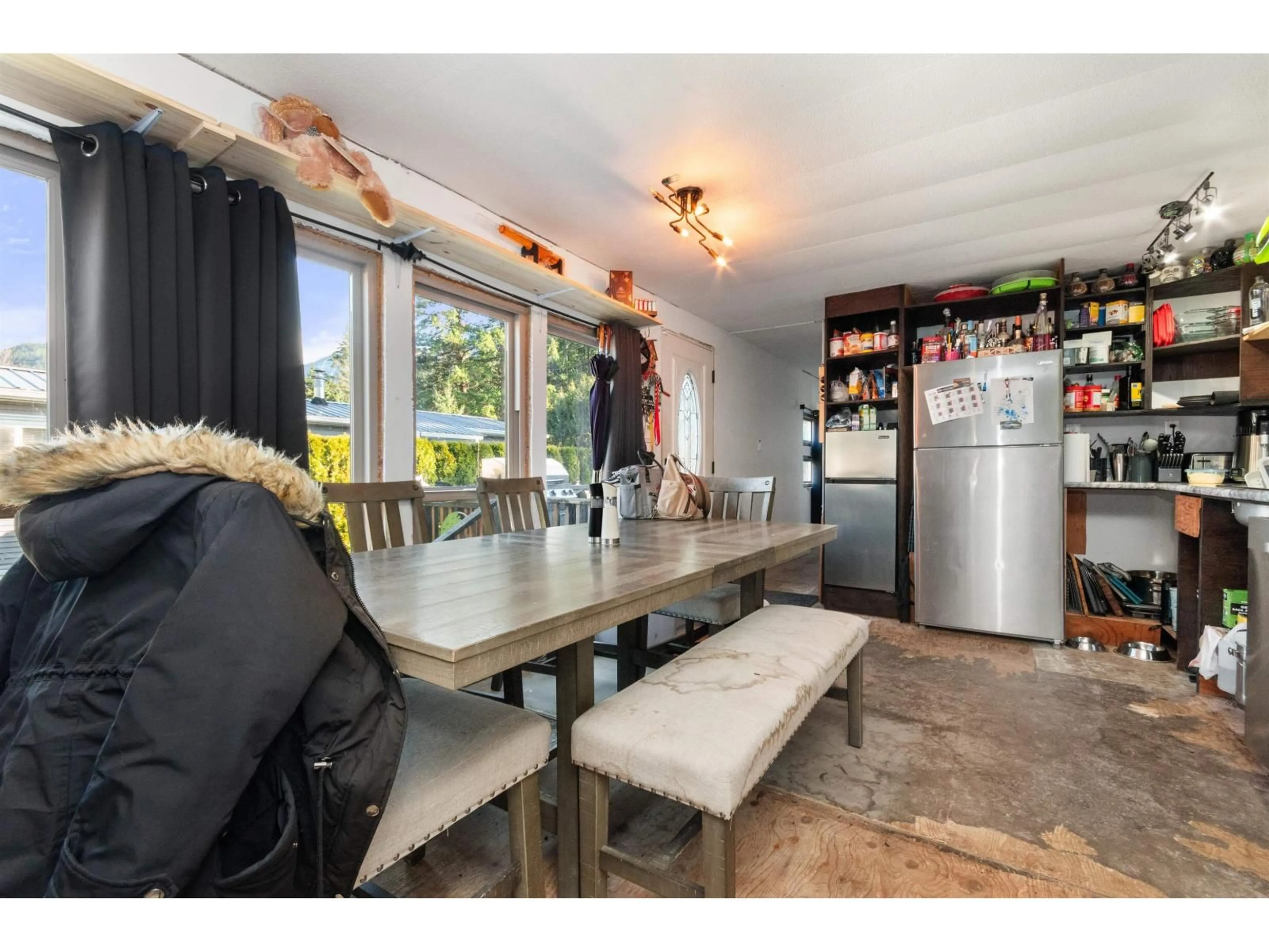 Dining room, wood/laminate floor for 111 - 65367 KAWKAWA LAKE ROAD, Hope British Columbia V0X1L1