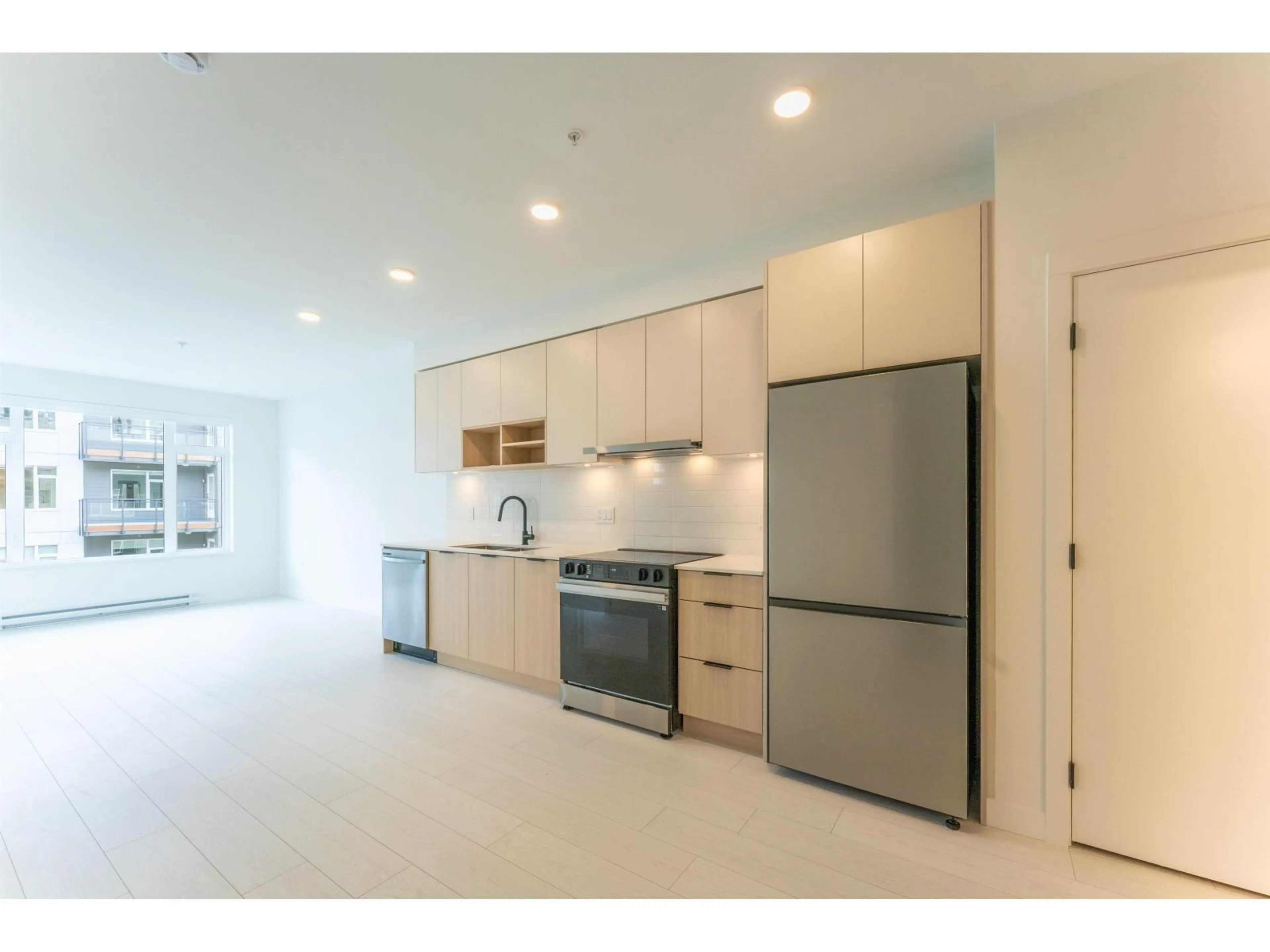 Open concept kitchen, unknown for 512 - 10466 138A STREET, Surrey British Columbia V3T0W3