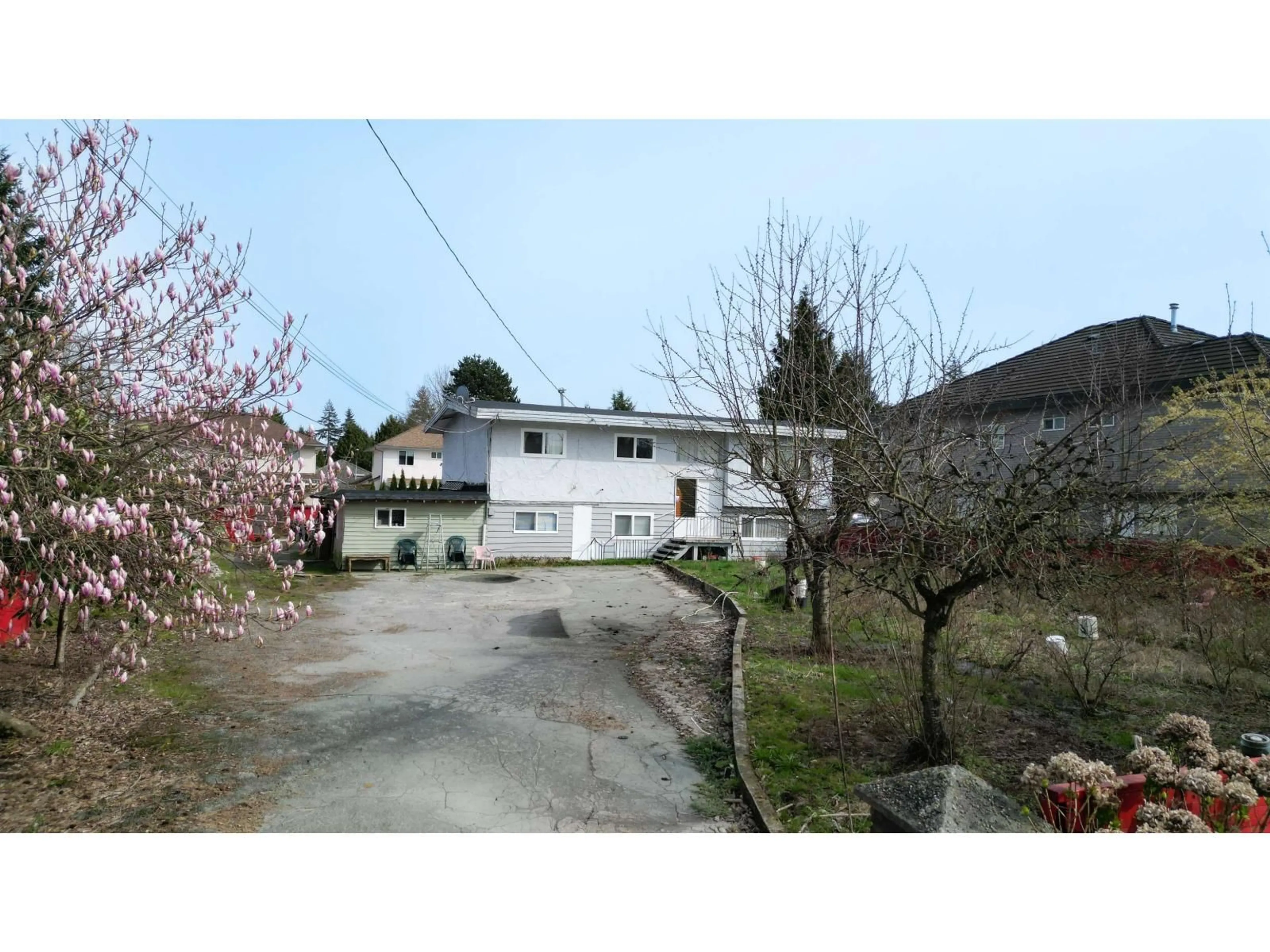 A pic from outside/outdoor area/front of a property/back of a property/a pic from drone, street for 9032 156 STREET, Surrey British Columbia V3R5Y8