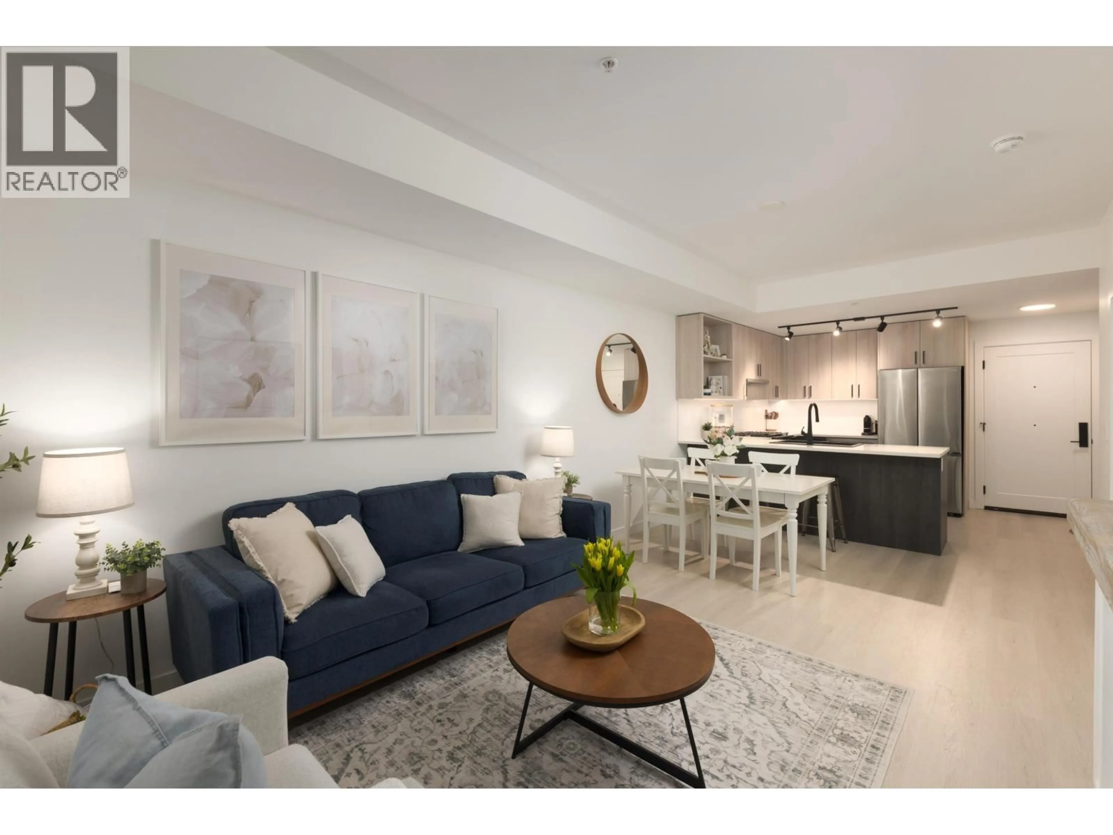 Living room with furniture, unknown for 208 - 1100 CLARKE ROAD, Port Moody British Columbia V3H0N3