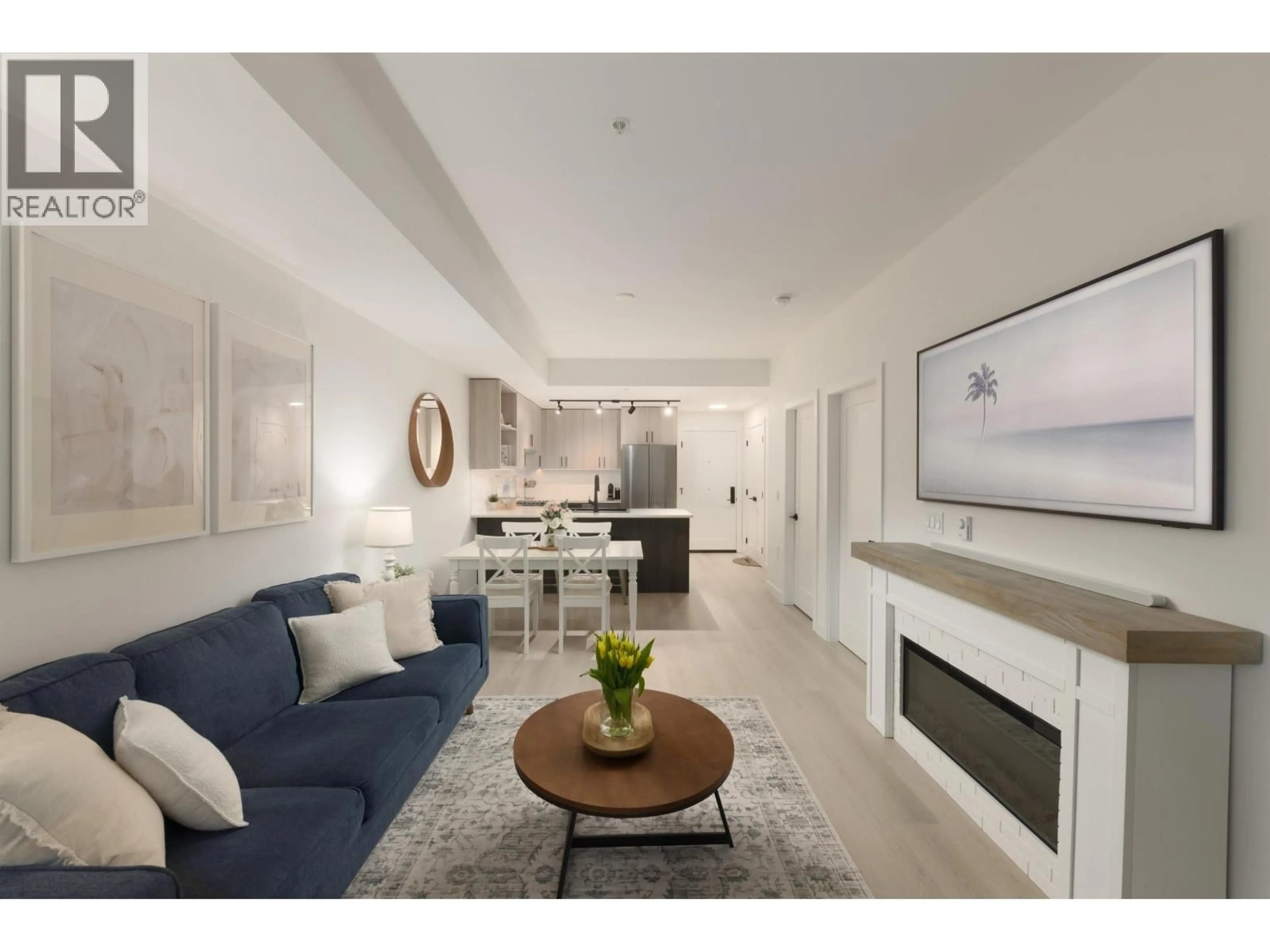 Living room with furniture, unknown for 208 - 1100 CLARKE ROAD, Port Moody British Columbia V3H0N3