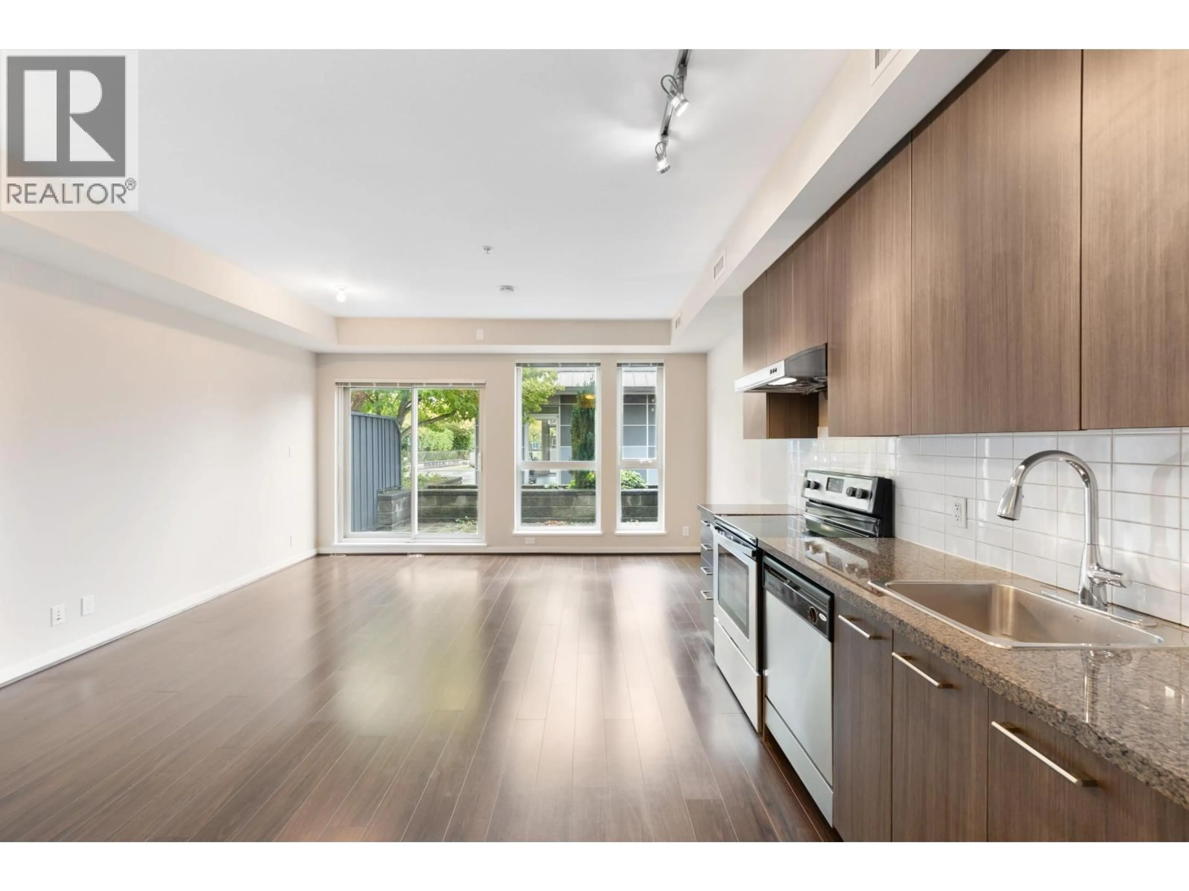 Open concept kitchen, wood/laminate floor for 282 - 4133 STOLBERG STREET, Richmond British Columbia V6X0J3