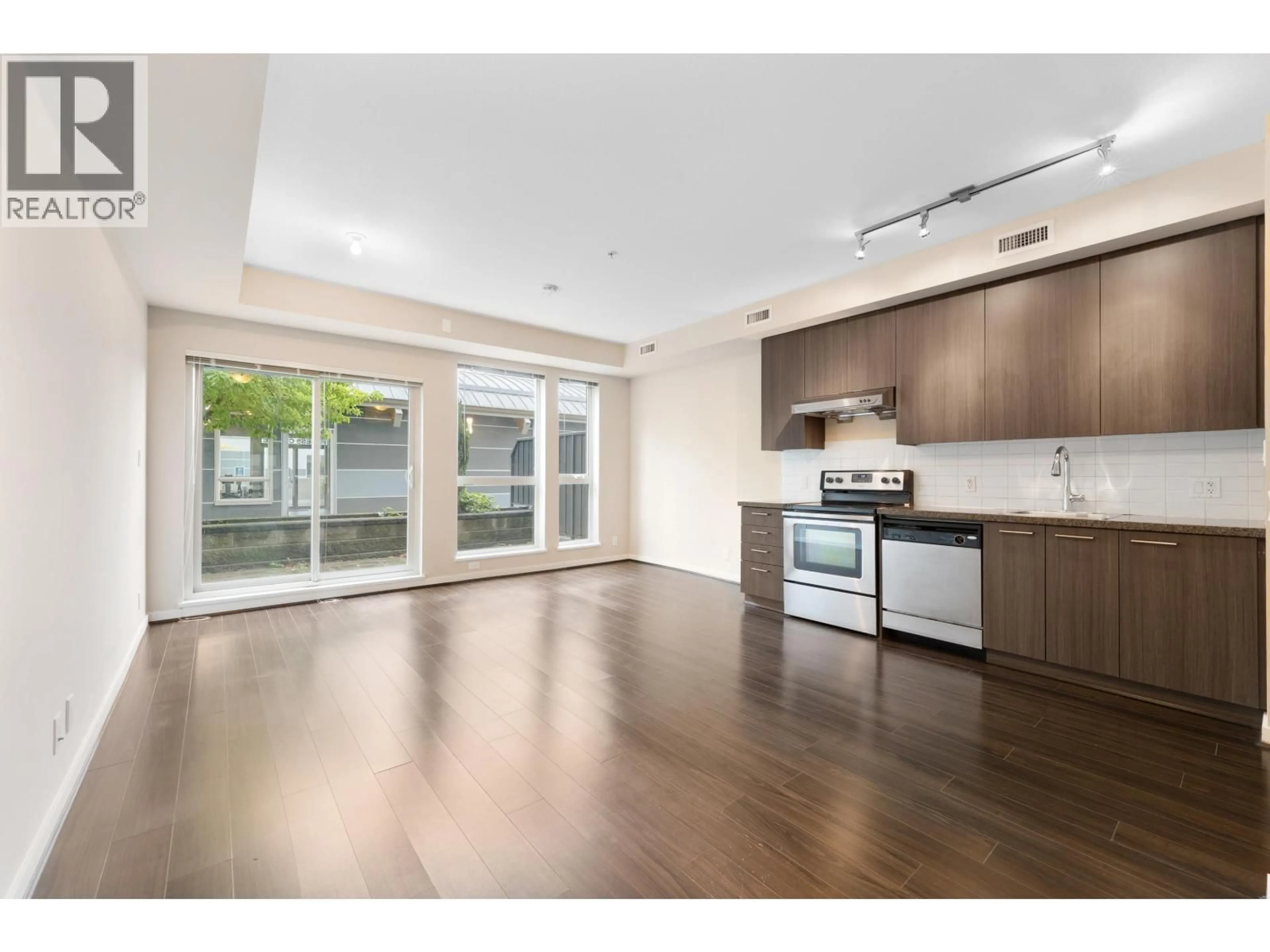 Open concept kitchen, wood/laminate floor for 282 - 4133 STOLBERG STREET, Richmond British Columbia V6X0J3